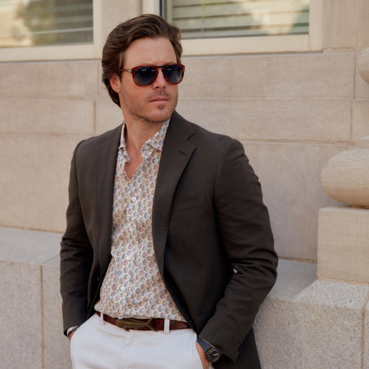 The Carroll Red & BlackPrint Shirt features a daring leaf pattern in vivid reds, blacks, and tans. Featuring striking white buttons, this sport shirt will take you from the office to the outdoors with a fearless look.  100% Cotton • Spread Collar • Long Sleeve • Machine Washable • Made in Italy • Return Policy