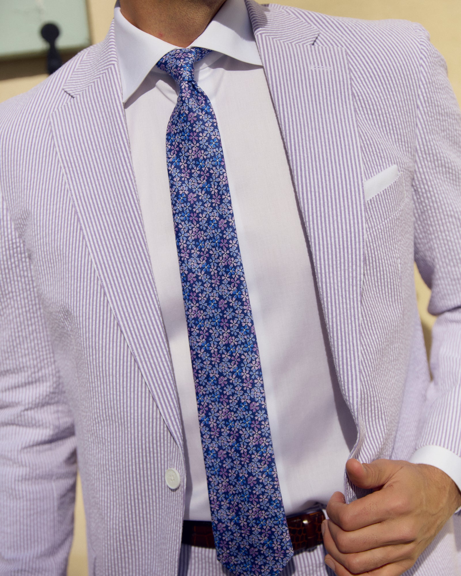 Turn heads in this exquisite Purple Haze Seersucker Stretch Sport Coat! Sleek and stylish, this classic is sure to cause a stir at your next event. With a unique purple hue and a comfortable stretch, this sport coat is perfect for adding a bold touch of sophistication to any look. Get your "haze" on and start feeling like a ten in this one-of-a-kind!