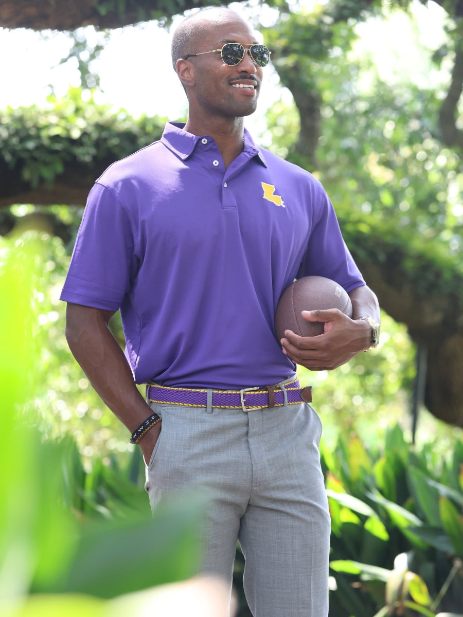 Purple, gold and a regal roar. and you are ready for Game Day! A classic style, a bold color, ready for a true Louisiana Saturday Night down in Baton Rouge.  95% Cotton / 5% Spandex • 3 Button Placket • No Chest Pocket • Imported • Machine Wash • Return Policy