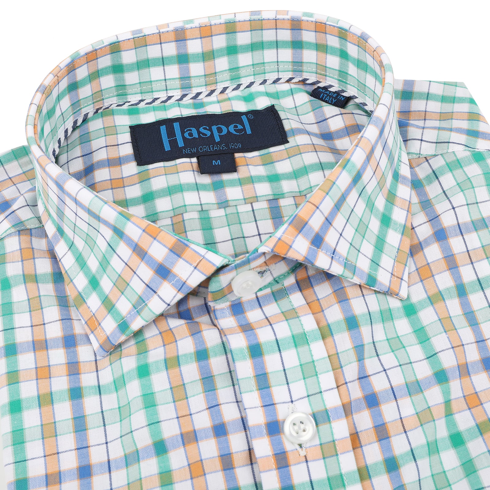 Add a pop of color to your spring wardrobe with the Audubon Green, Orange and Blue Check. Perfect for a playful and unique style, this check pattern is sure to turn heads. </p> <p>100% Cotton • Spread Collar • Long Sleeve • Chest Pocket • Machine Washable • Made in Italy