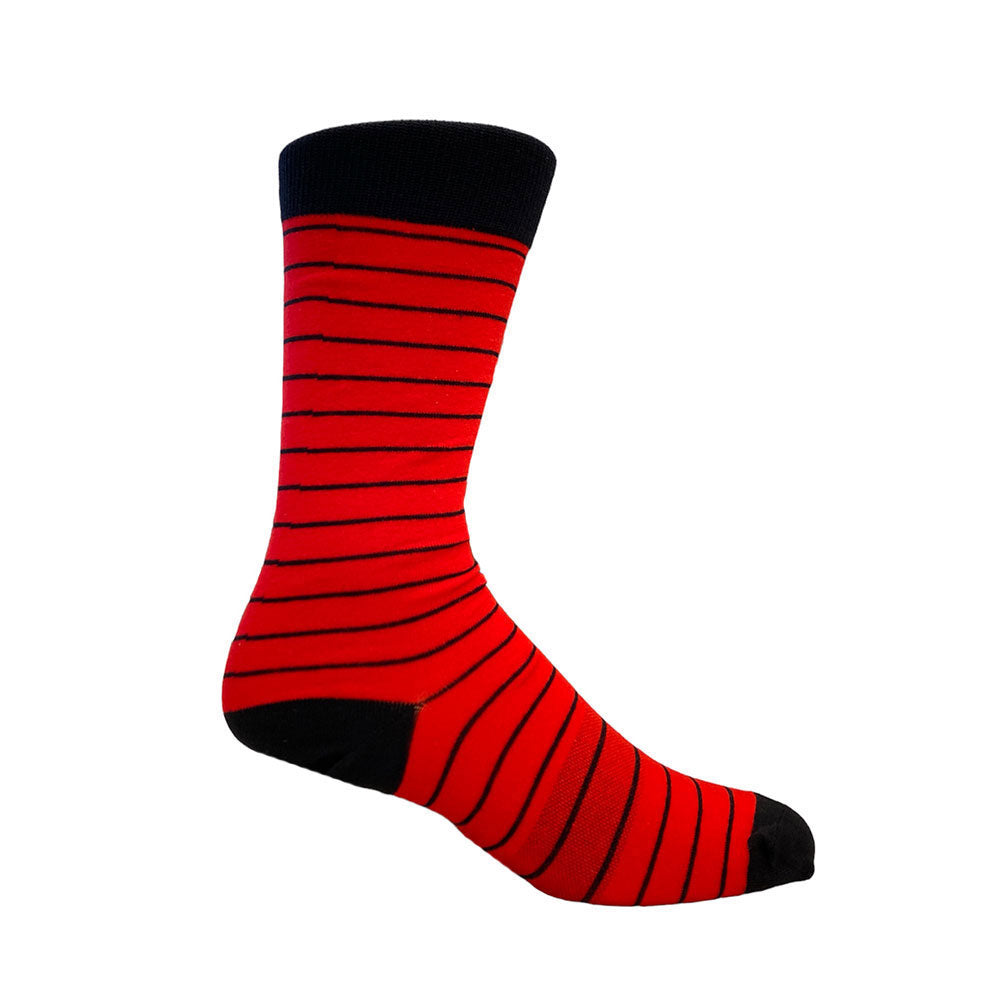 Stripes are our game, make them a part of yours. Life is too short to wear boring socks! #damnright 70% Mercerized Cotton 29% Nylon 1% Spandex Fits Size 8-12 Machine Washable Made in the USA Return Policy