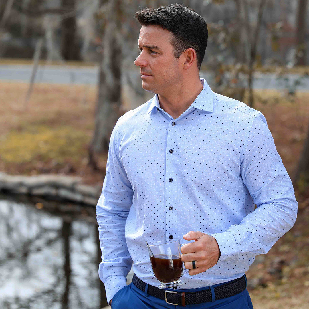 Get ready to make a statement with this elegant Erato Blue End on End look featuring a striking navy and brown diamond pattern. Made from high-quality materials, this shirt is a perfect look for any stylish occasion. 