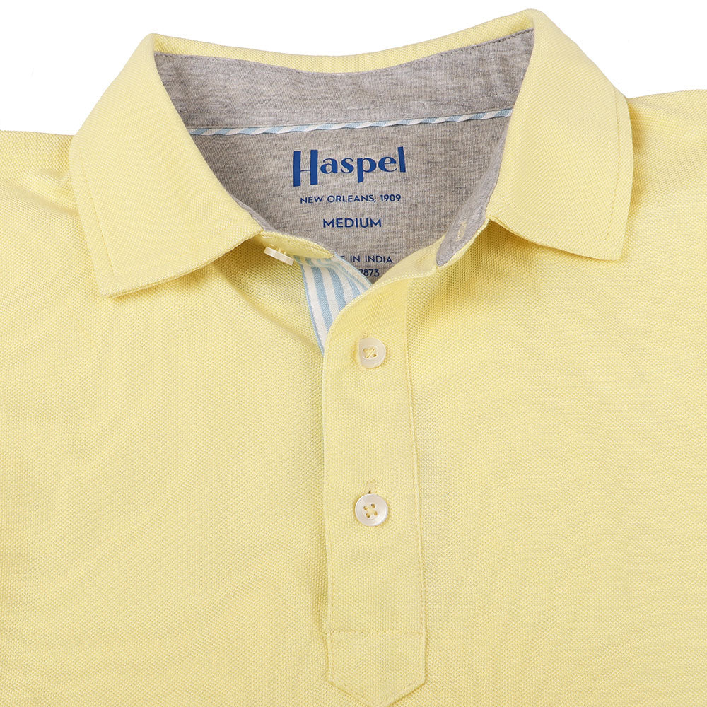 The softest pique polo to ever drape your statuesque torso. Enjoy that future perma-grin as you experience the touch and feel of a shirt that&#39;s simple in nature but exudes the quality of a Haspel man.  Our Signature Seersucker Piping and Placket • 3 Button Placket • Open Sleeve • Tagless/Printed Label for Ultimate Comfort • Stretch Comfort • 60% Cotton / 40% Polyester • Machine Washable • Return Policy
