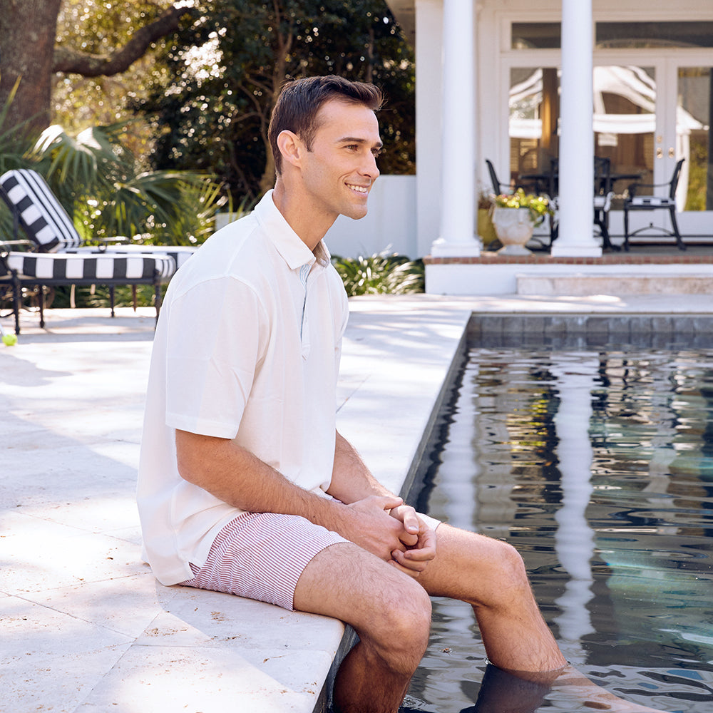 The softest pique polo to ever drape your statuesque torso. Enjoy that future perma-grin as you experience the touch and feel of a shirt that's simple in nature but exudes the quality of a Haspel man.  Our Signature Seersucker Piping and Placket • 3 Button Placket • Open Sleeve • Tagless/Printed Label for Ultimate Comfort • Stretch Comfort • 60% Cotton / 40% Polyester • Machine Washable • Return Policy