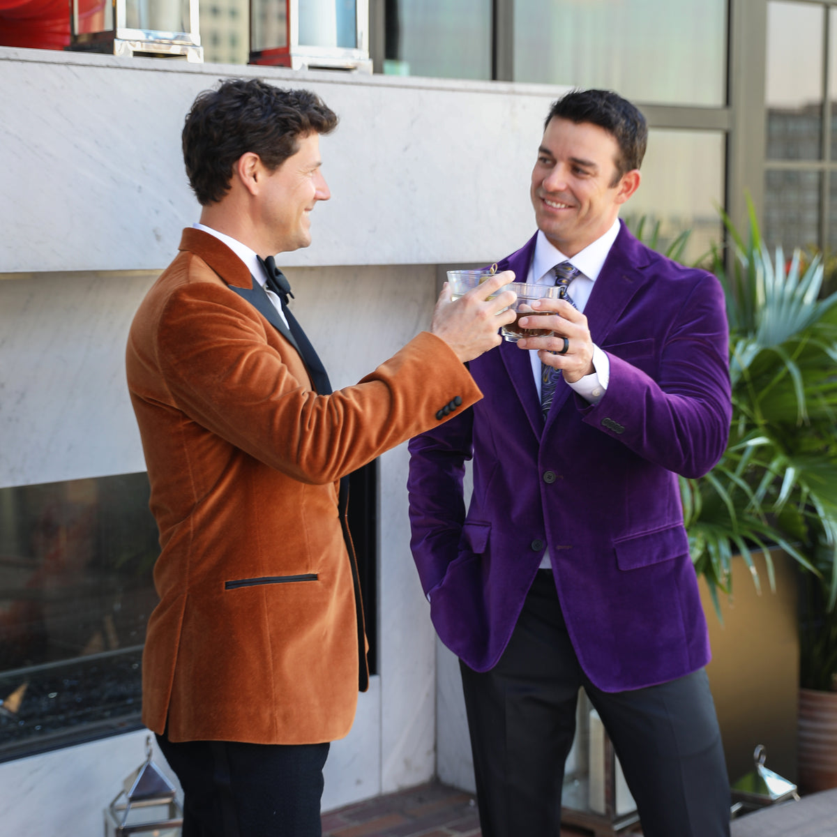 Turn heads and express your style with the Toulouse Tobacco Velvet Dinner Jacket. This retro-inspired jacket is tailored from luxurious velvet, offering an elegant statement piece for any occasion. Its tobacco coloring adds a timeless appeal, perfect for a classic look that stands out.  100% Cotton • Toulouse Tailored Fit • Natural Shoulder • One Button Closure • Satin Trim Besom Pockets • Satin Covered Buttons• Fully Lined • 2 Side Vents • Satin Peak Lapel • Dry Clean Only