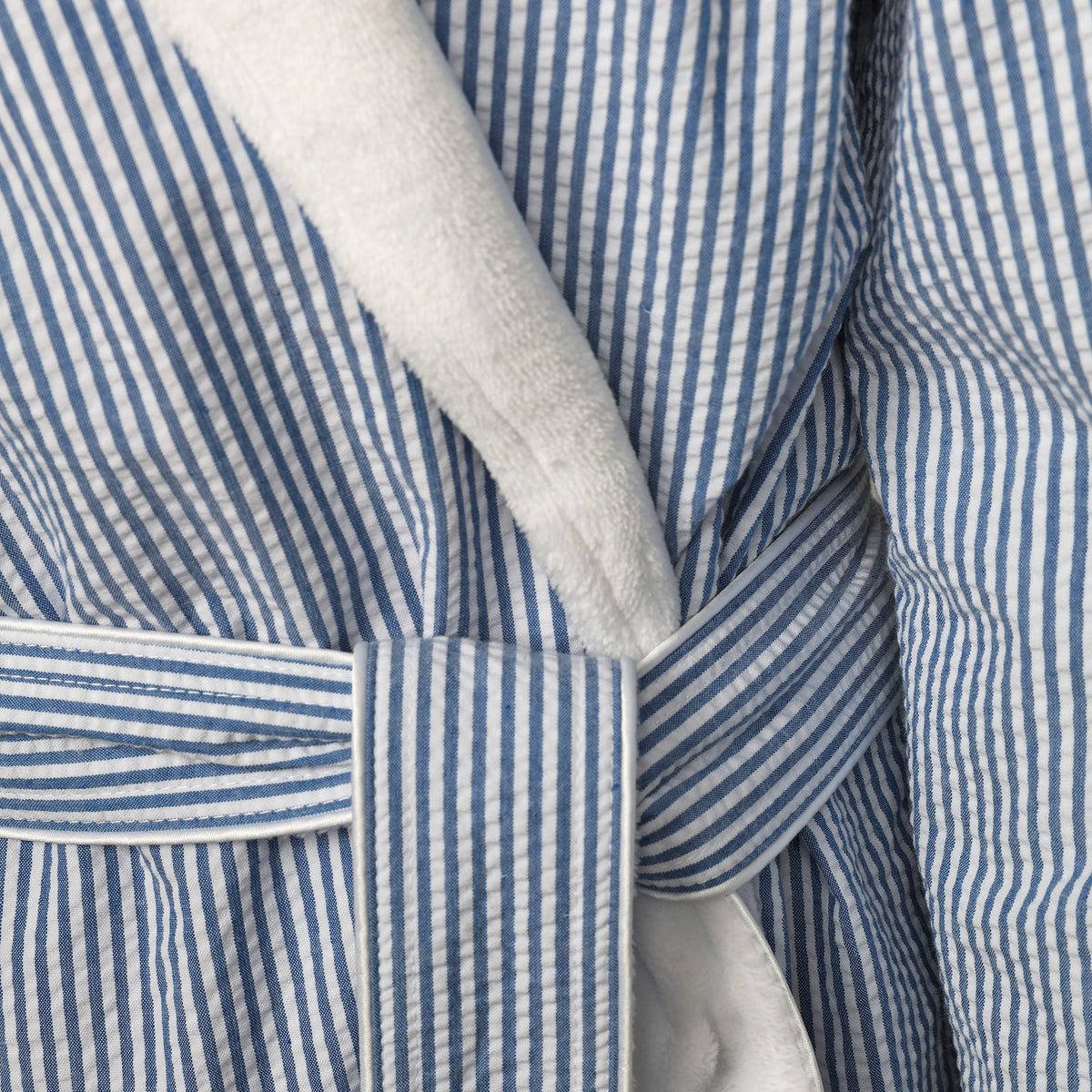 Our plush lined navy & white seersucker robe is perfect for cozy, lazy days around the house or on vacation. Look stunning while crossing absolutely nothing off of your to-do list.