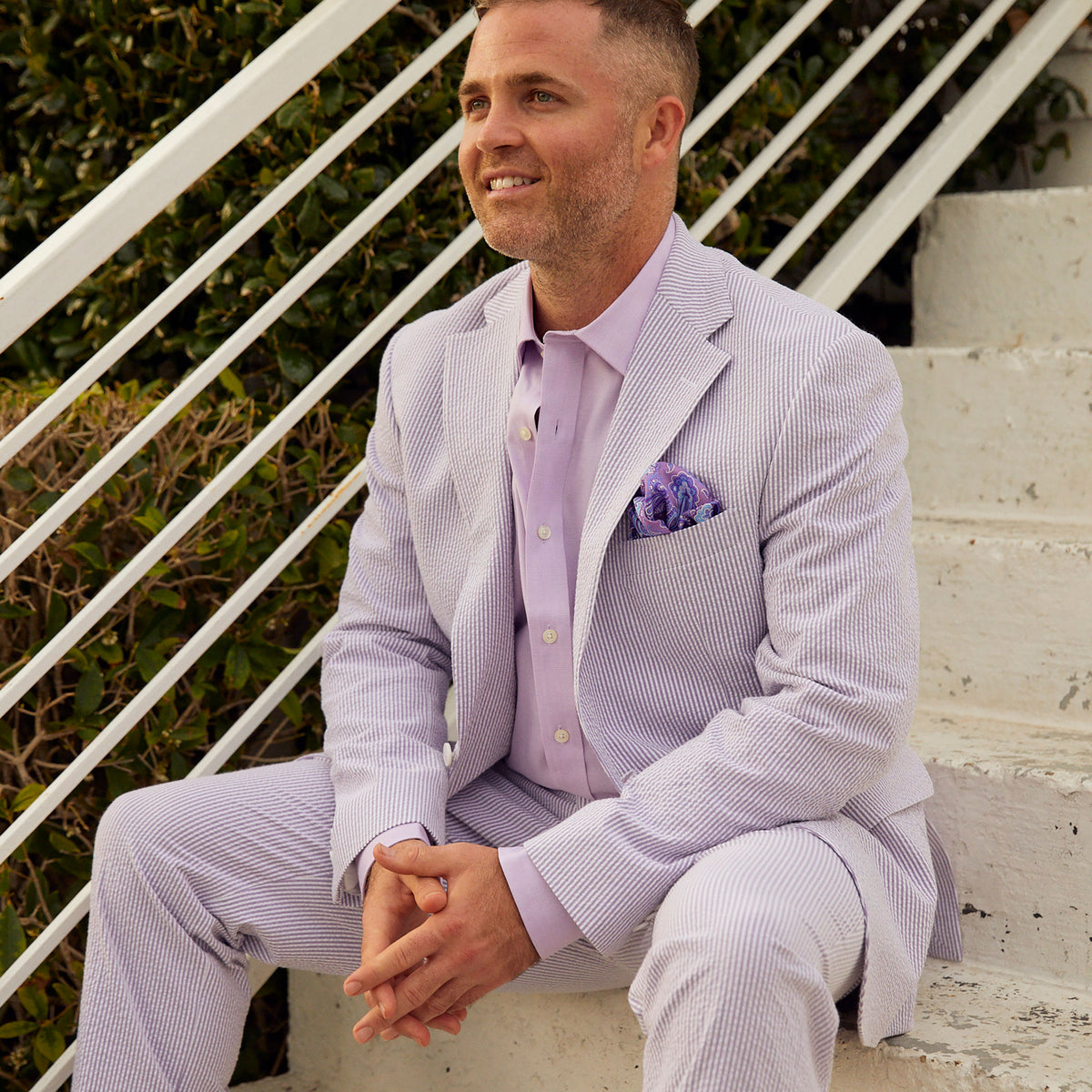 Turn heads in this exquisite Purple Haze Seersucker Stretch Sport Coat! Sleek and stylish, this classic is sure to cause a stir at your next event. With a unique purple hue and a comfortable stretch, this sport coat is perfect for adding a bold touch of sophistication to any look. Get your &quot;haze&quot; on and start feeling like a ten in this one-of-a-kind!