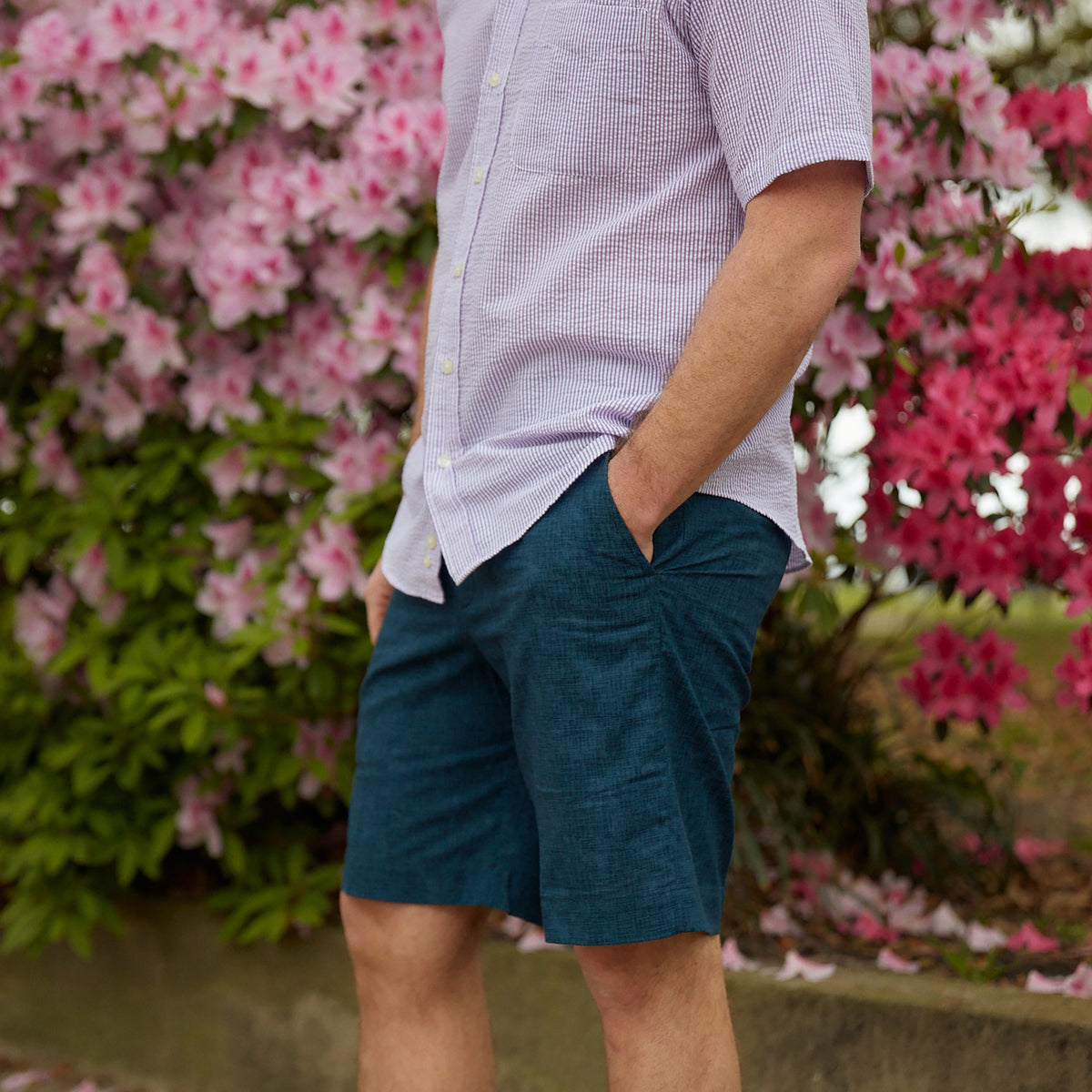Keep it in neutral with a little intrigue with navy and subtle crosshatch printed on 100% cotton warm weather ready shorts.  100% Cotton • Traditional Fit • Flat Front • Button Through Closure • Two Front Slash Pockets • 9" Inseam • Machine Washable • Imported