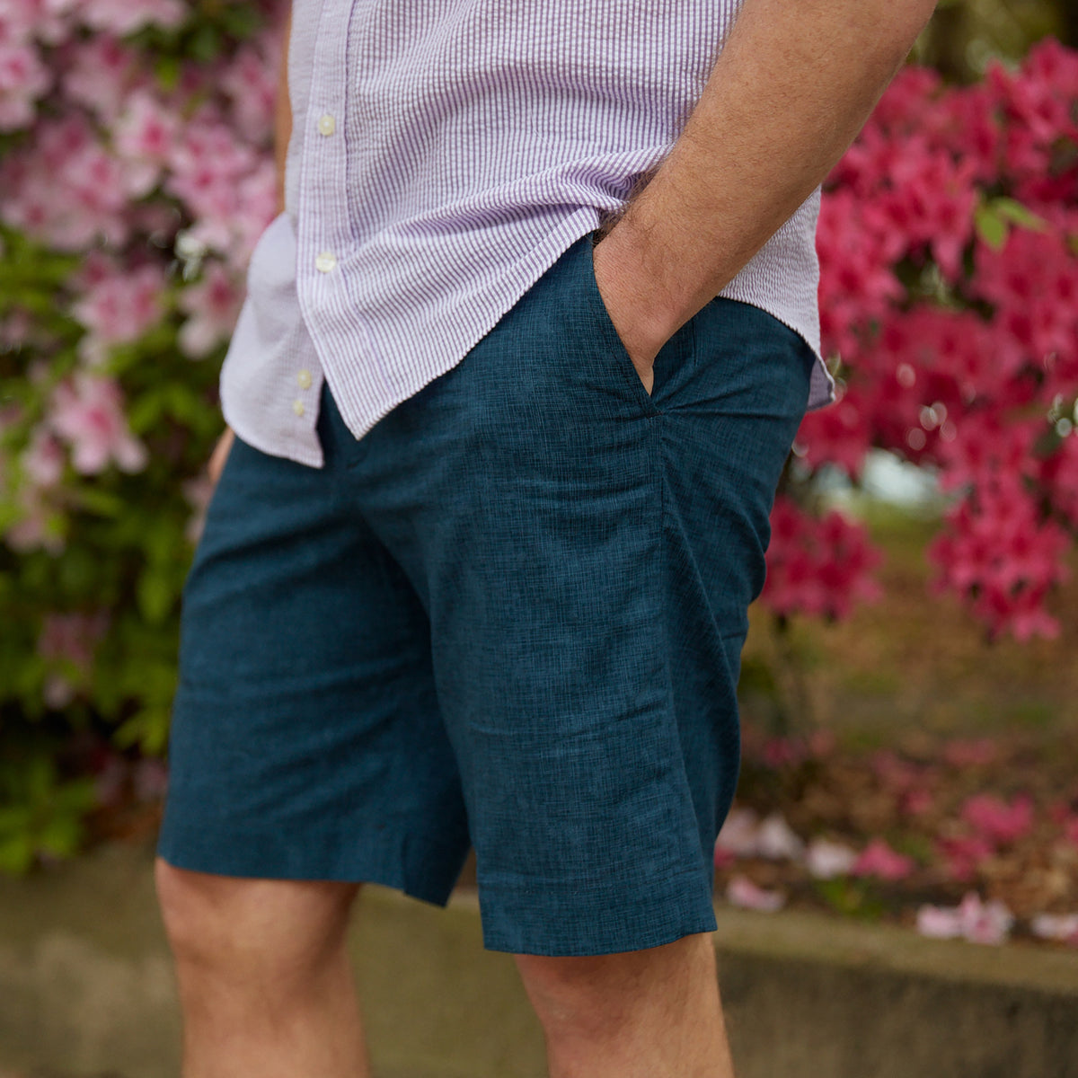Keep it in neutral with a little intrigue with navy and subtle crosshatch printed on 100% cotton warm weather ready shorts.  100% Cotton • Traditional Fit • Flat Front • Button Through Closure • Two Front Slash Pockets • 9" Inseam • Machine Washable • Imported