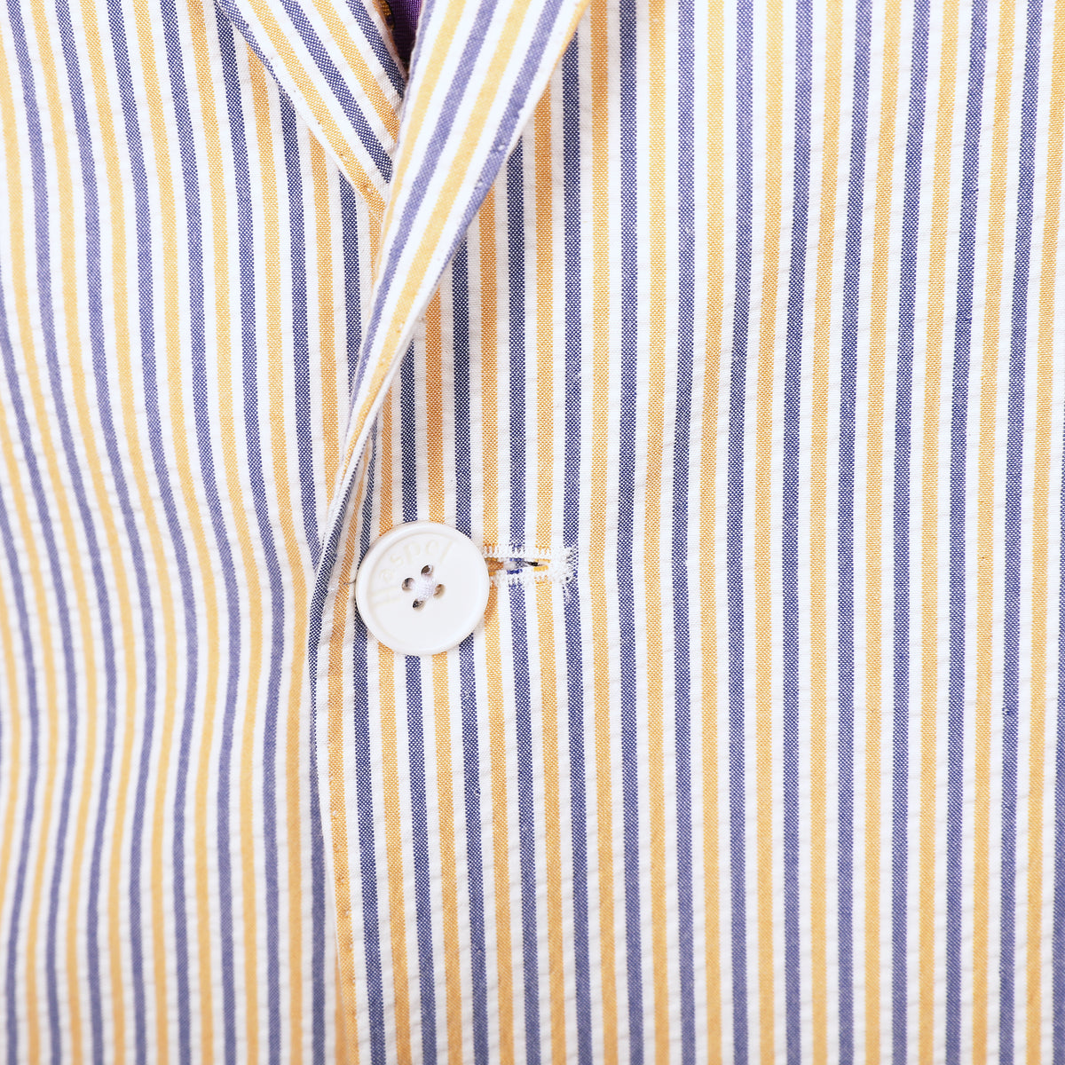 Show your purple & gold spirit in our Audubon Purple & Gold Seersucker Suit.  ** Pant waist is 6" smaller than the chest measurement. For example, if you order a 40R jacket, the pant size will be 34 **  100% Cotton Haspel Exclusive Seersucker • Maximized Seersucker Pucker • Audubon Classic Fit • Natural Shoulder • Two Buttons • Flap Pockets • 3/4 Lined for Maximum Cool • Side Vents • Notch Lapel • Dry Clean • Imported