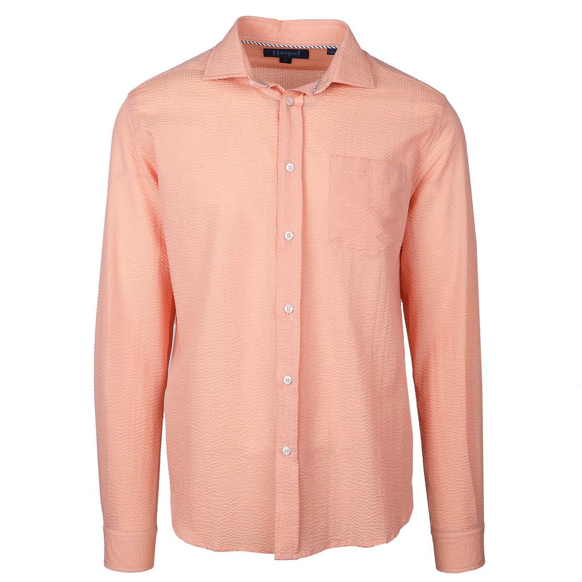 Seersucker all year long in a prefectly peach seersucker shirt. Subtle, lightweight, and a texture they begs a second look.  100% Cotton Seersucker • Spread Collar • Long Sleeve • Chest Pocket • Machine Washable • Made in Italy