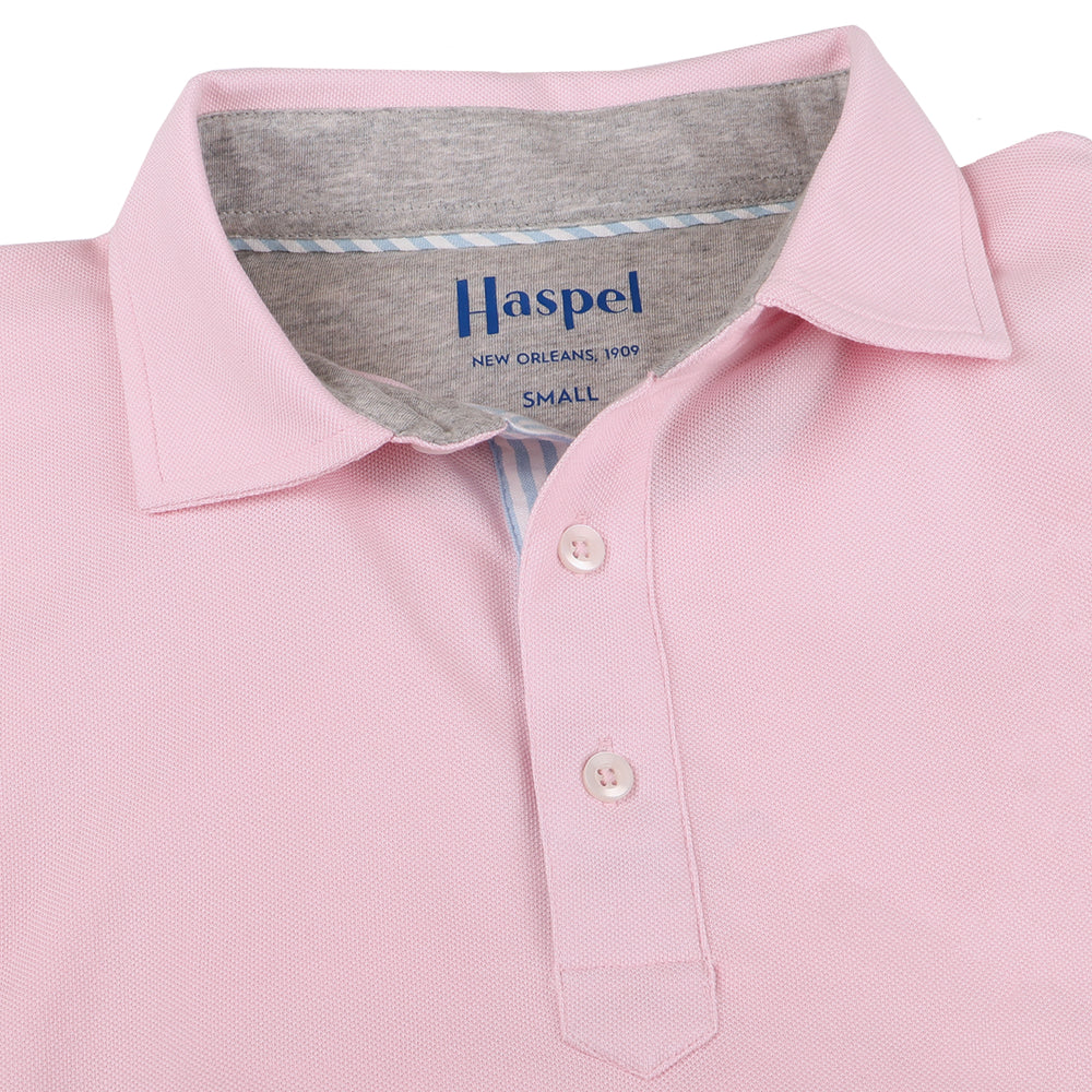 The softest pique polo to ever drape your statuesque torso. Enjoy that future perma-grin as you experience the touch and feel of a shirt that's simple in nature but exudes the quality of a Haspel man. Our Signature Seersucker Piping and Placket • 3 Button Placket • Open Sleeve • Tagless/Printed Label for Ultimate Comfort • Stretch Comfort • 60% Cotton / 40% Polyester • Machine Washable • Return Policy