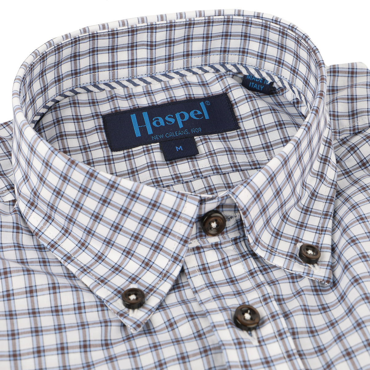 Enjoy the luxury of 100% cotton, Italian made quality, and eye-catching blue and brown graph check.  100% Cotton • Button Down Collar • Long Sleeve • Contrast Buttons • Chest Pocket • Machine Washable • Made in Italy