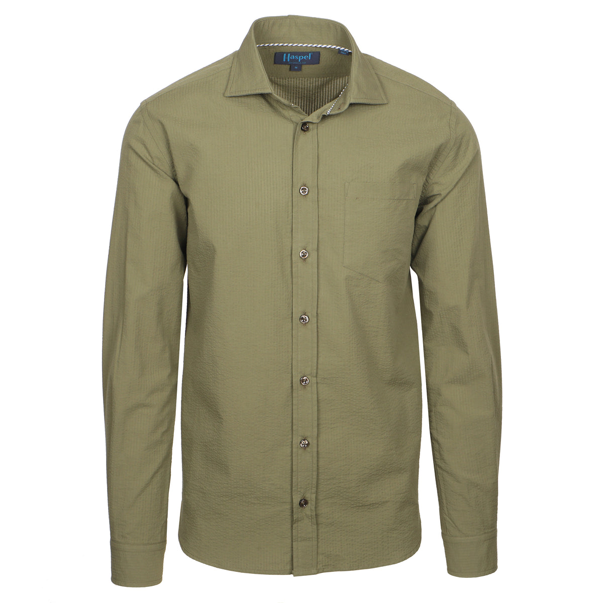 Seersucker all year long in a green olive seersucker shirt. Subtle, lightweight, and a texture they begs a second look.  100% Cotton Seersucker  •  Spread Collar  •  Long Sleeve  •  Chest Pocket  •  Machine Washable  •  Made in Italy