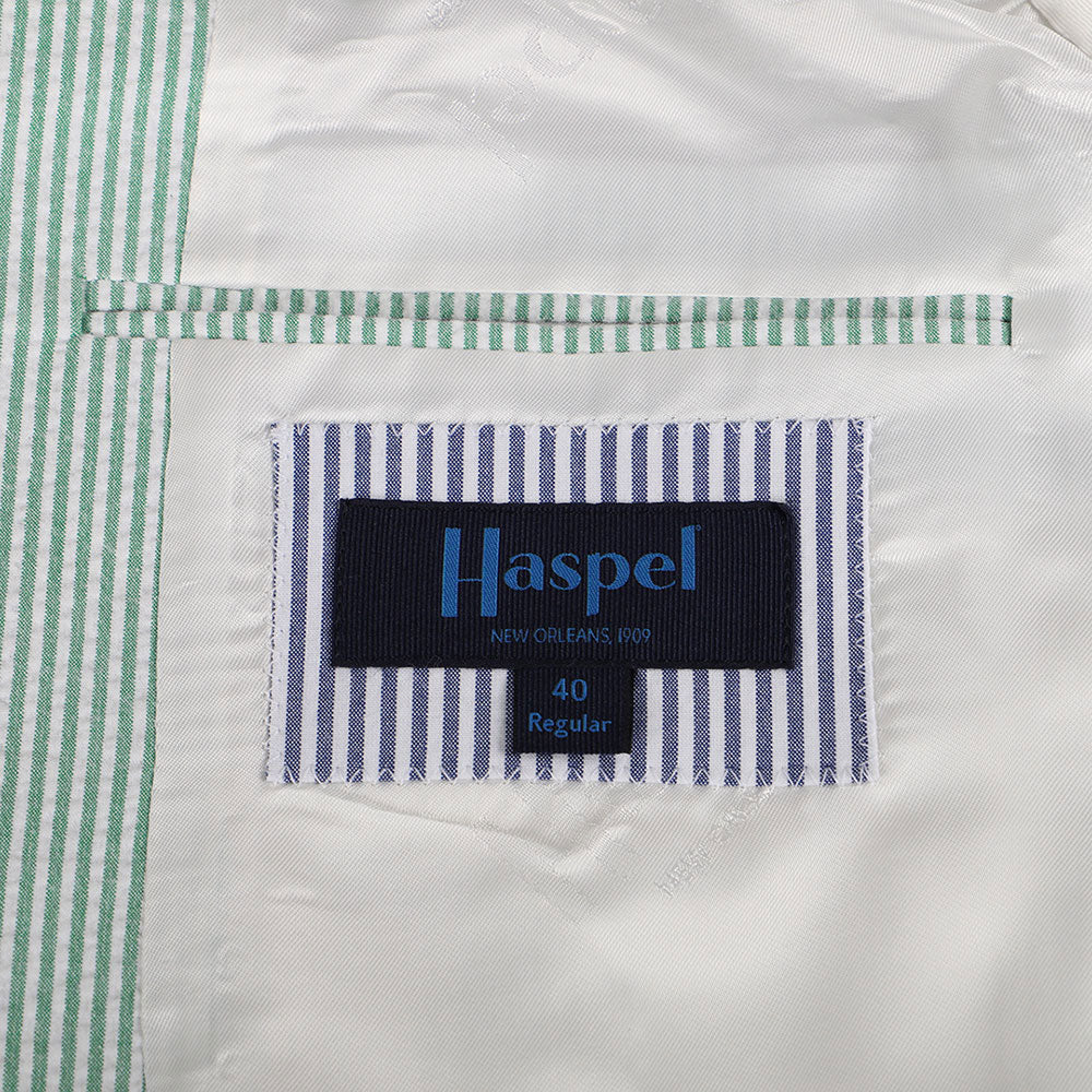 The chill of a pewter cup, the finish of a fine Kentucky bourbon, & the crunch of that good ice - get that Derby Day feeling in our refreshingly minty stretch seersucker.   97% Cotton / 3% Lycra Haspel Exclusive Seersucker Stretch Fabric • Maximized Seersucker Pucker • Audubon Classic Fit • Natural Shoulder • Two Buttons • Flap Pockets • 3/4 Lined for Maximum Cool • Side Vents • Notch Lapel • Dry Clean • Made in USA
