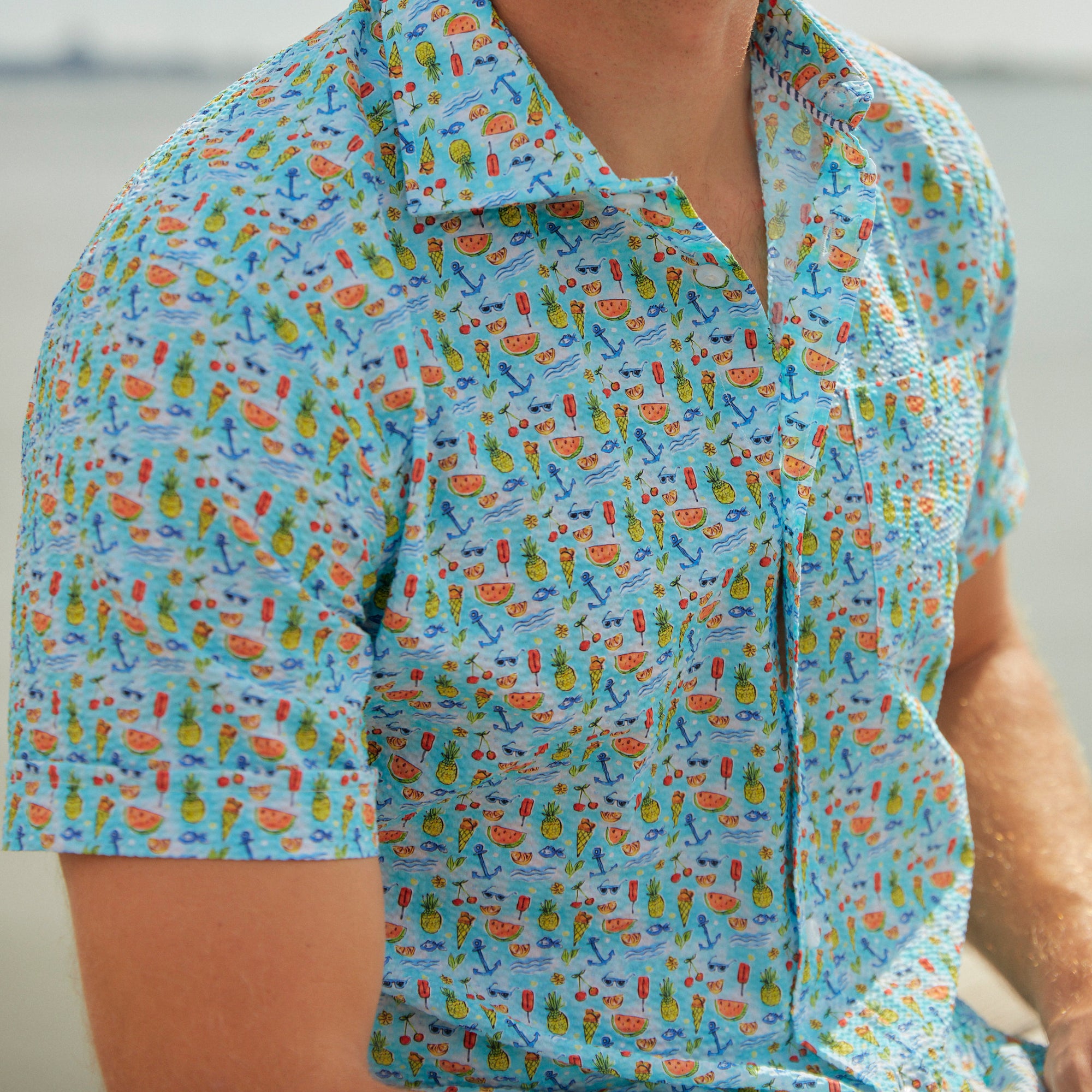 Fun in the sun or under the water. You're on summer break in this shirt and you're having a good time.   100% Cotton Seersucker • Spread Collar • Short Sleeve • Chest Pocket • Machine Washable • Made in Italy