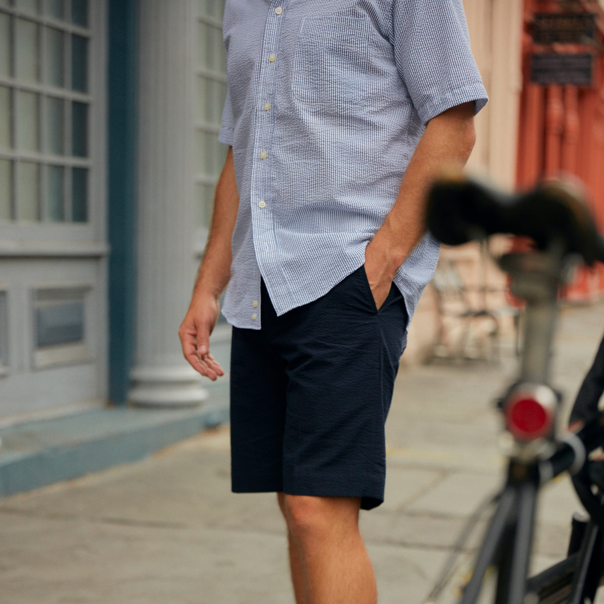 Seersucker all year long in a classic navy &amp; white seersucker shirt. Subtle, lightweight, and a texture they begs a second look.  100% Cotton Seersucker • Button Down Collar • Short Sleeve • Chest Pocket • Machine Washable • Imported