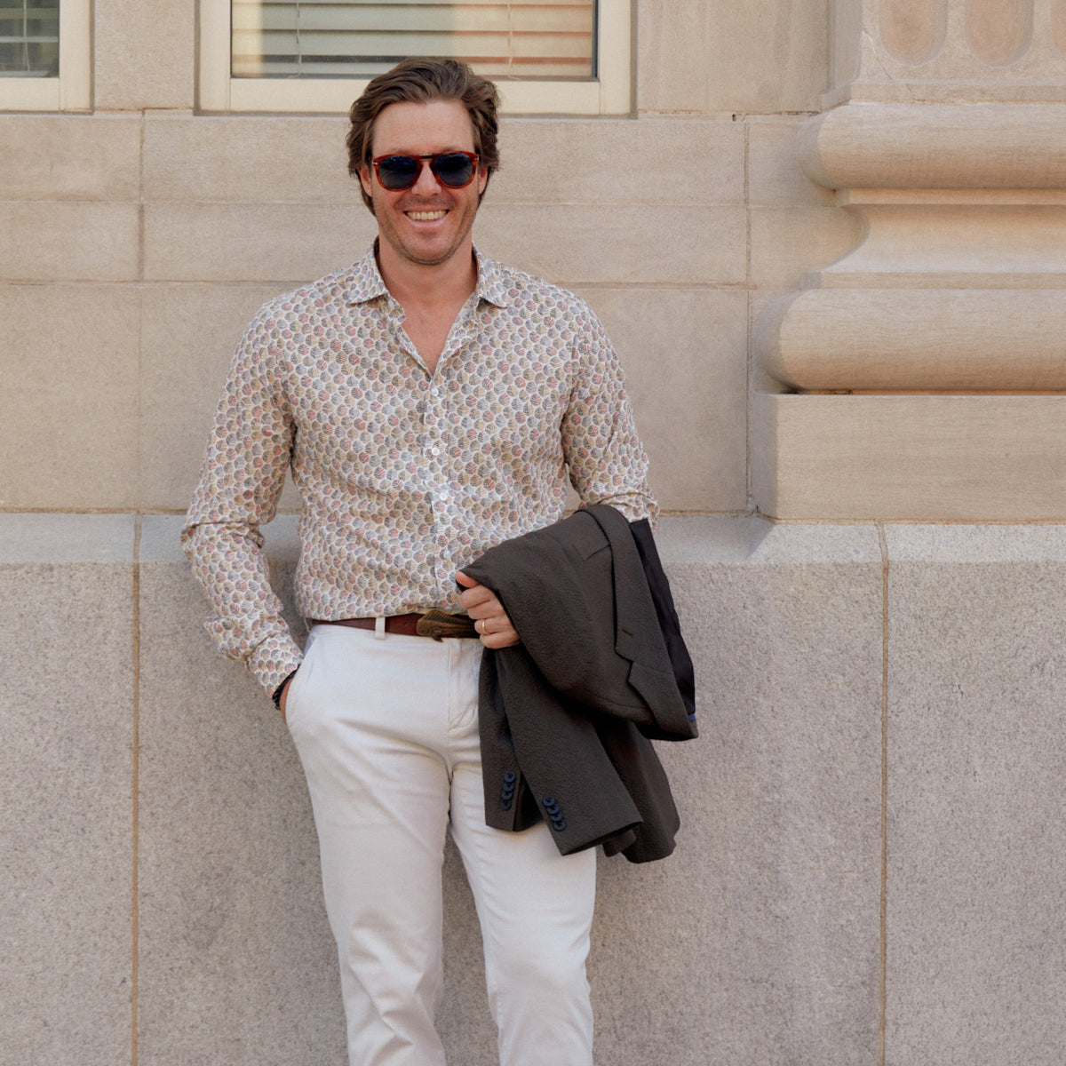 The Carroll Red &amp; BlackPrint Shirt features a daring leaf pattern in vivid reds, blacks, and tans. Featuring striking white buttons, this sport shirt will take you from the office to the outdoors with a fearless look.  100% Cotton • Spread Collar • Long Sleeve • Machine Washable • Made in Italy • Return Policy