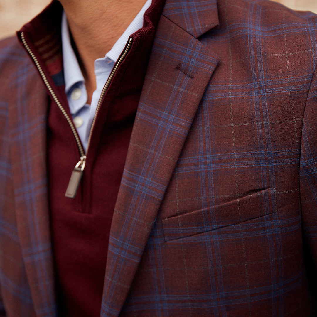 A showstopper for a showstopper! Each Roffe Red Plaid Sport Coat is lovingly made of deluxe wool for year-round finesse and style. 