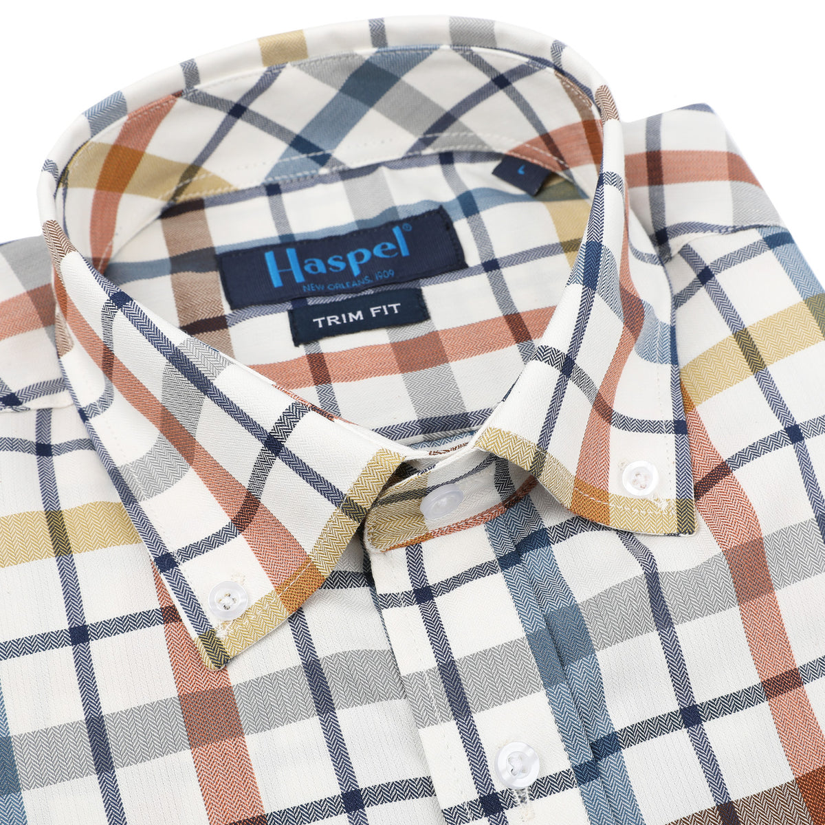 Rock the rustic vibes with Apres Blue, Brown &amp; Rust Brushed Cotton Check. This cozy plaid shirt features an eye-catching blue, brown, and rust colorway that&#39;s perfect for channeling New Orleans style. Be prepared to make a statement any time you wear it.  100% Cotton • Button Down Collar • Long Sleeve • Double Chest Pocket • Machine Washable • Made in Italy • Return Policy