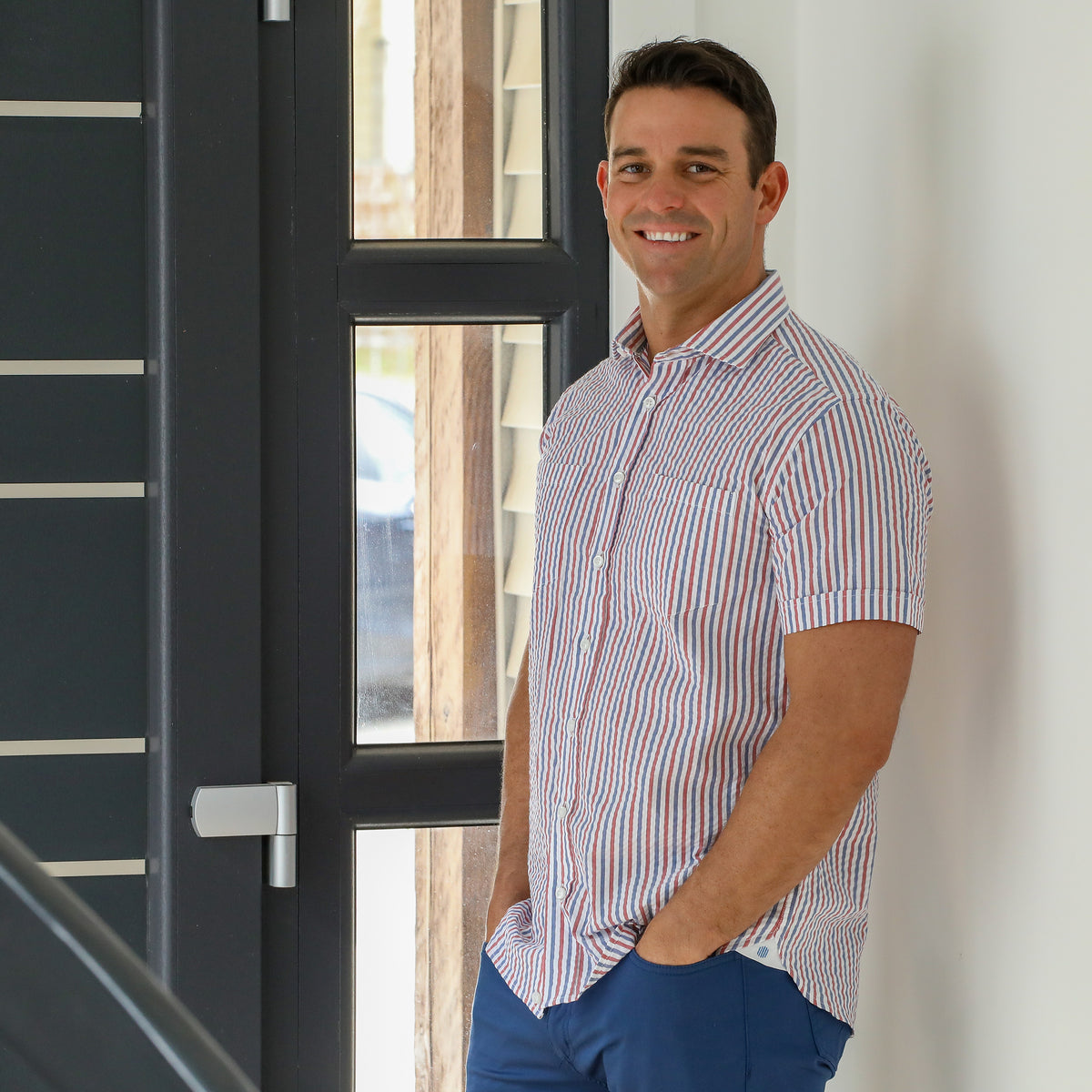 Add some seaside flair to your wardrobe with Baonne&#39;s Red, White and Blue Seersucker Stripe look. The classic casual style is elevated by the playful red and blue stripes, making it a must-have for any occasion.&amp;nbsp;&lt;/p&gt; &lt;p&gt;100% Cotton Seersucker • Spread Collar • Long Sleeve • Double Chest Pocket • Machine Washable • Made in Italy