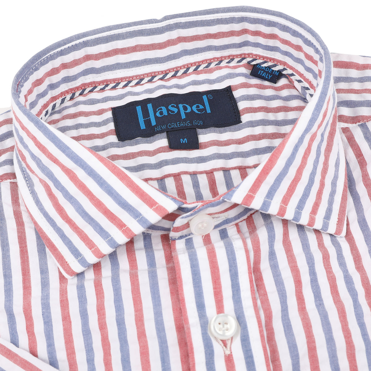 Add some seaside flair to your wardrobe with Baonne&#39;s Red, White and Blue Seersucker Stripe look. The classic casual style is elevated by the playful red and blue stripes, making it a must-have for any occasion.&amp;nbsp;&lt;/p&gt; &lt;p&gt;100% Cotton Seersucker • Spread Collar • Long Sleeve • Double Chest Pocket • Machine Washable • Made in Italy