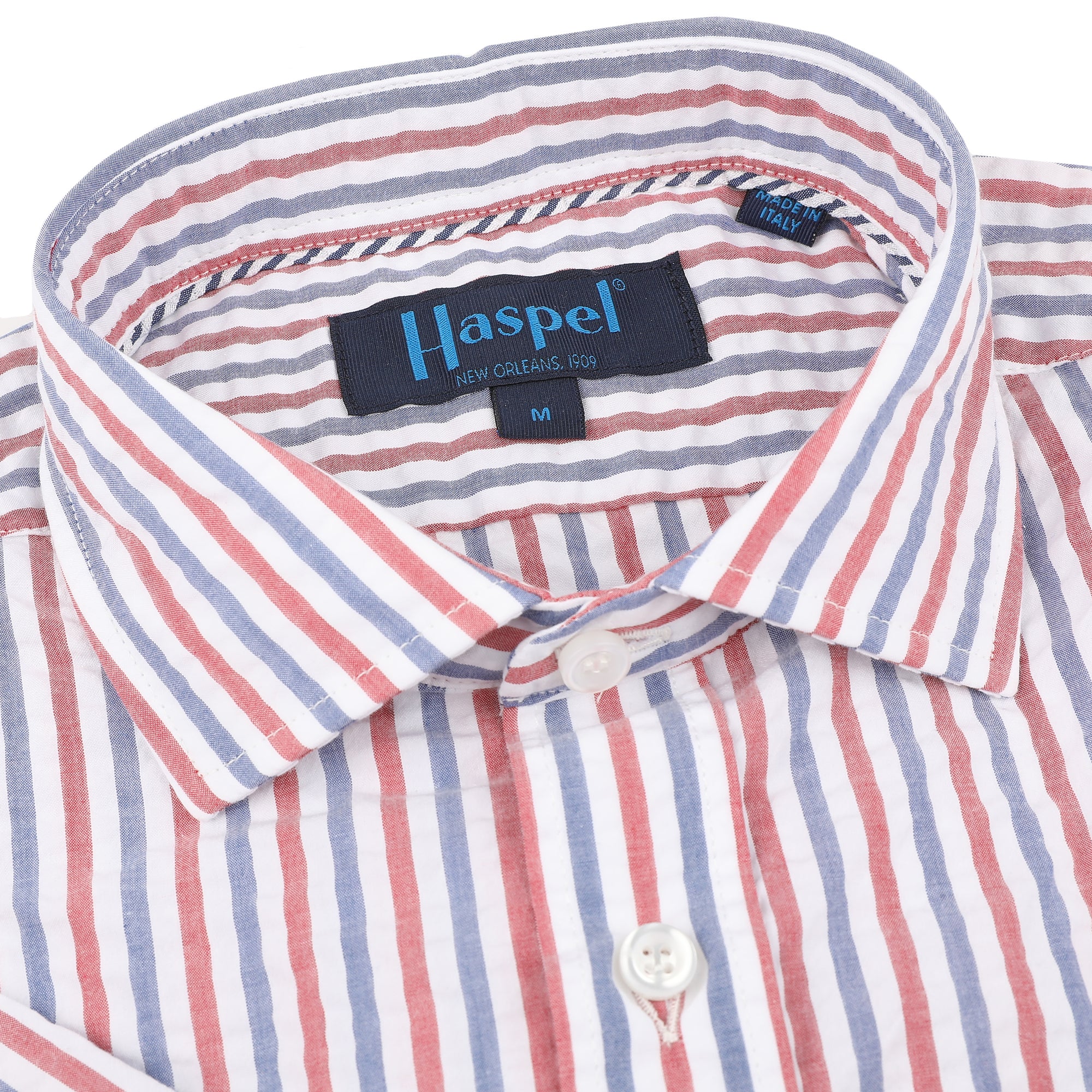Add some seaside flair to your wardrobe with Baonne's Red, White and Blue Seersucker Stripe look. The classic casual style is elevated by the playful red and blue stripes, making it a must-have for any occasion.&nbsp;</p> <p>100% Cotton Seersucker • Spread Collar • Long Sleeve • Double Chest Pocket • Machine Washable • Made in Italy