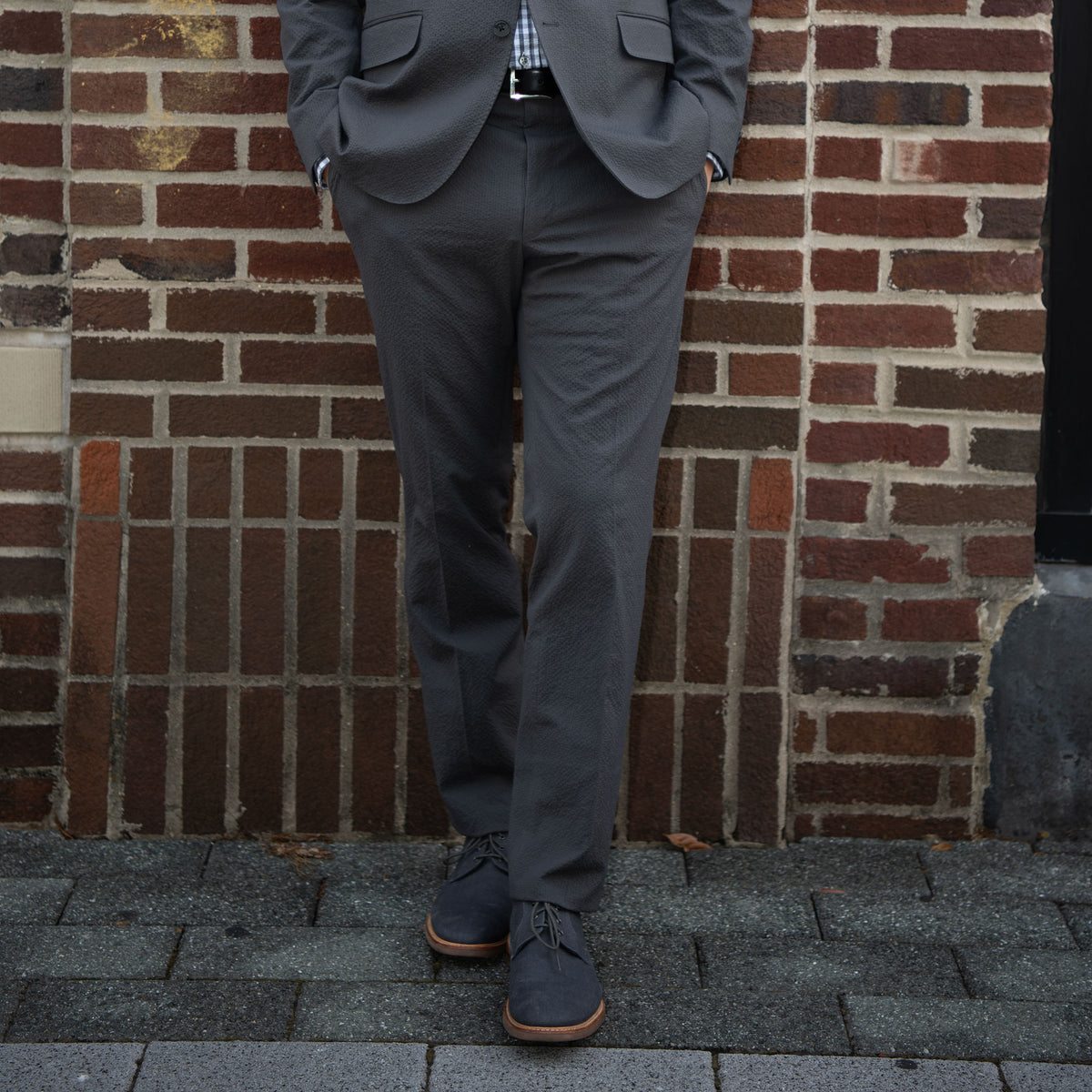 Exploring all the devilry the Big Easy has to offer, you&#39;ll cast your spell in our Voodoo Gray Seersucker. Beware the dark arts and dress the part in lightweight American made seersucker. Devilishly daring yet enchantingly divine.  97% Cotton / 3% Lycra Haspel Exclusive Seersucker Stretch Fabric • Maximized Seersucker Pucker • Audubon Classic Fit • Natural Shoulder • Two Buttons • Flap Pockets • 3/4 Lined for Maximum Cool • Side Vents • Notch Lapel • Dry Clean • Made in USA