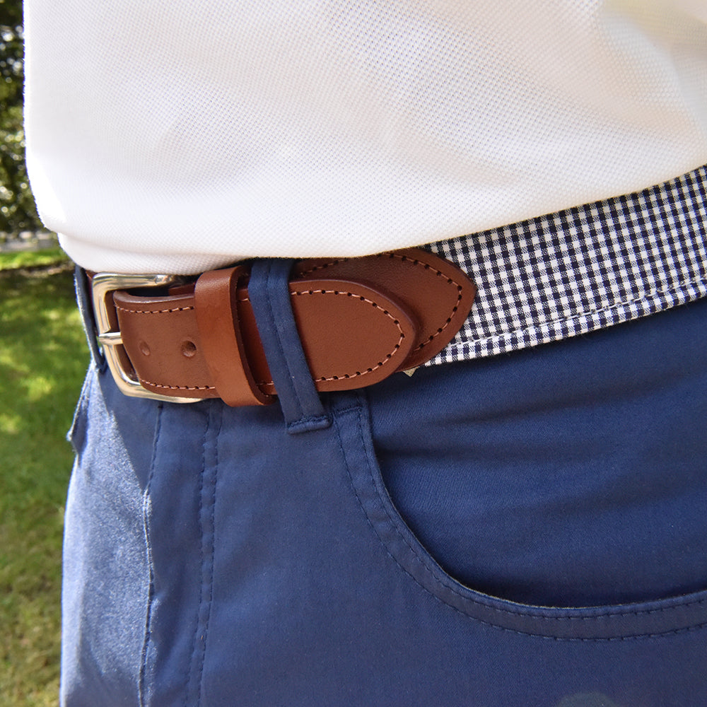 Our Haspel x T.B. Phelps collaboration belt is a stylish addition to any summer wardrobe, features navy gingham fabric. Perfect for your summer trip! The navy gingham is backed on sturdy nylon webbing, finished with a sturdy briar tab set and nickel finish buckle.