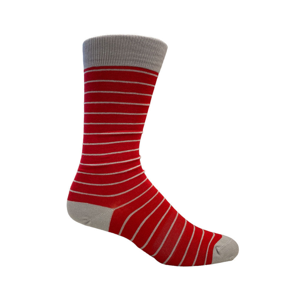 Stripes are our game, make them a part of yours. Life is too short to wear boring socks! #damnright  70% Mercerized Cotton 29% Nylon 1% Spandex Fits Size 8-12 Machine Washable Made in the USA Return Policy