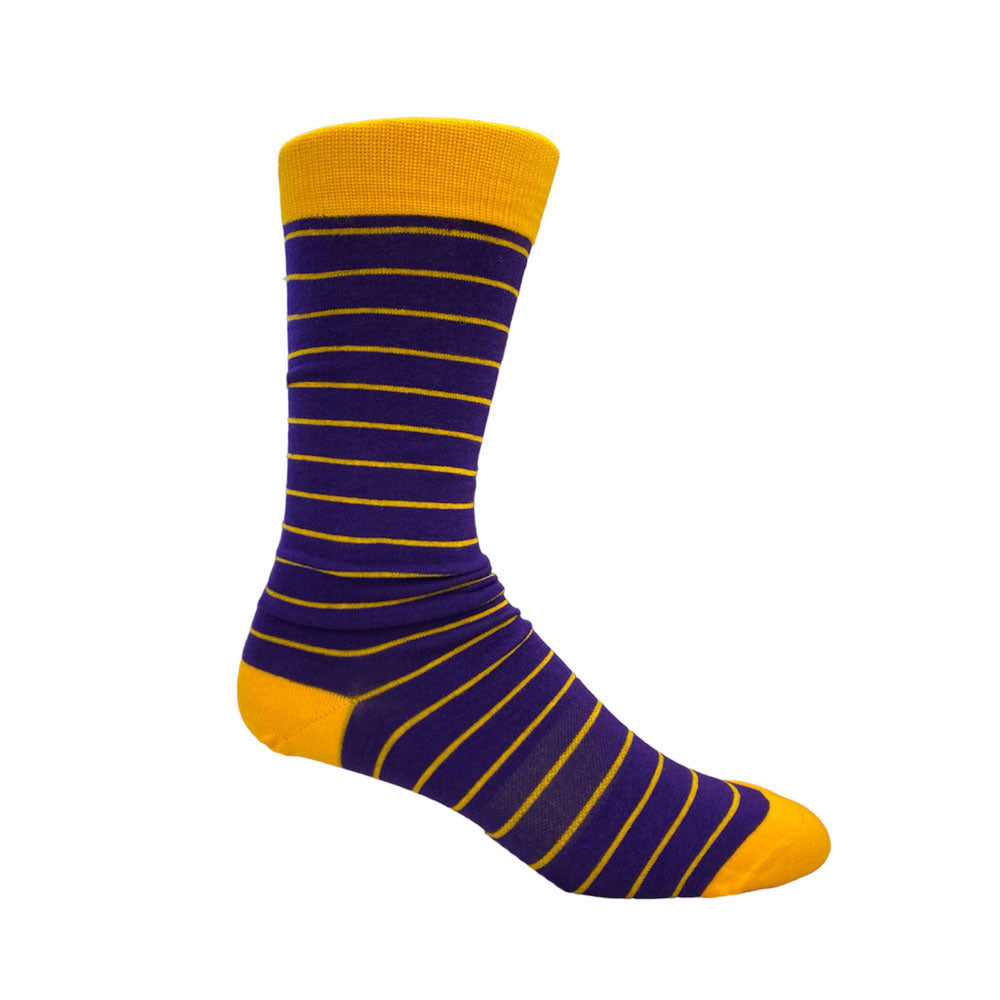 Stripes are our game, make them a part of yours. Life is too short to wear boring socks! #damnright  70% Mercerized Cotton 29% Nylon 1% Spandex Fits Size 8-12 Machine Washable Made in the USA Return Policy