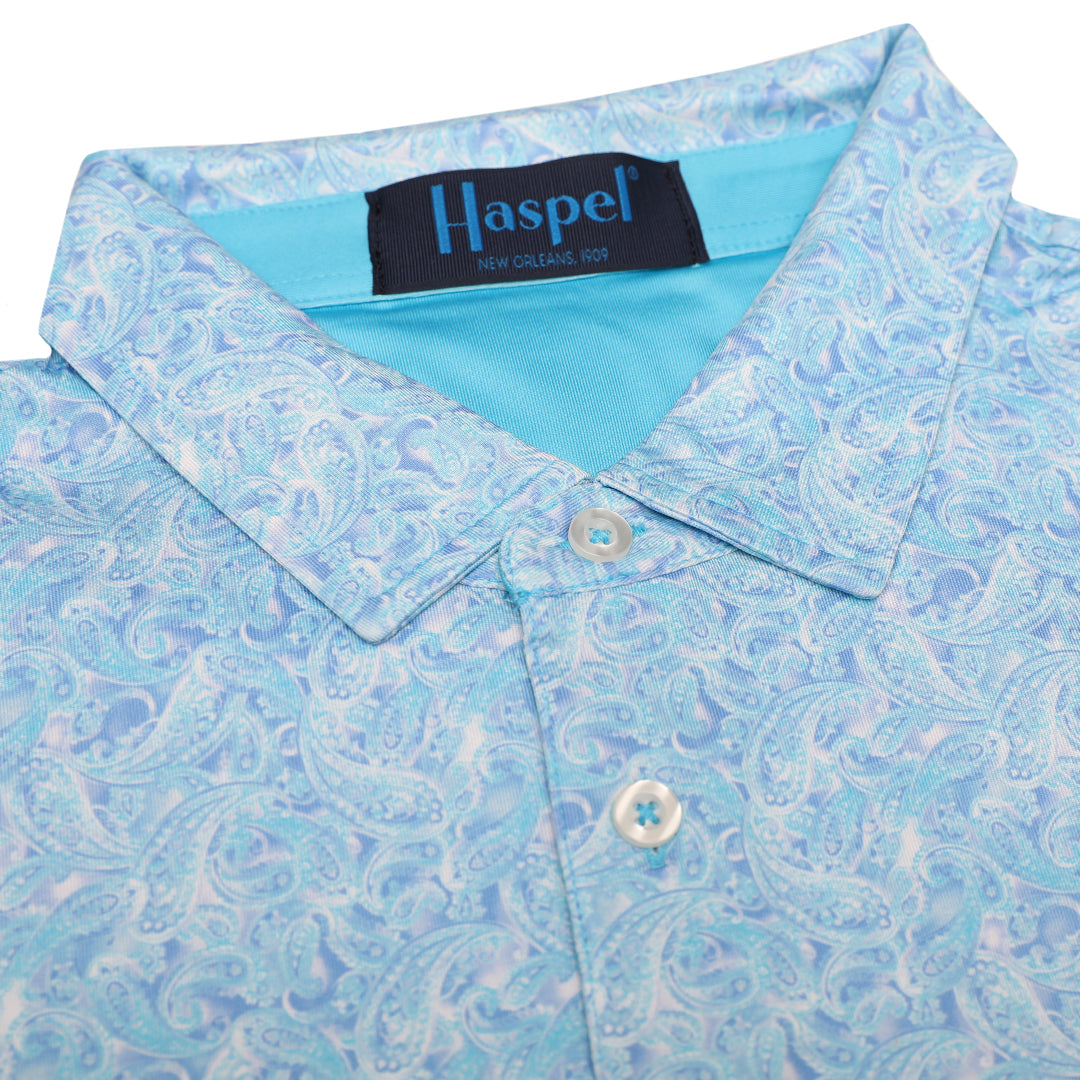 Elevate your golf game or casual game with our regal Clubhouse Blue &amp; White Paisley Polo. The light blue paisley pattern offers both elegance and premium performance for an exclusive and sophisticated feel.