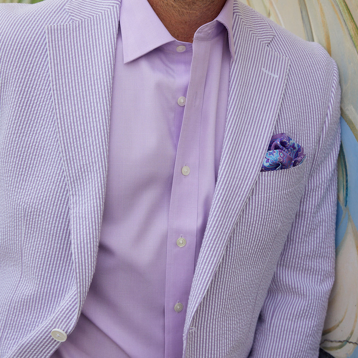 Turn heads in this exquisite Purple Haze Seersucker Stretch Sport Coat! Sleek and stylish, this classic is sure to cause a stir at your next event. With a unique purple hue and a comfortable stretch, this sport coat is perfect for adding a bold touch of sophistication to any look. Get your &quot;haze&quot; on and start feeling like a ten in this one-of-a-kind!