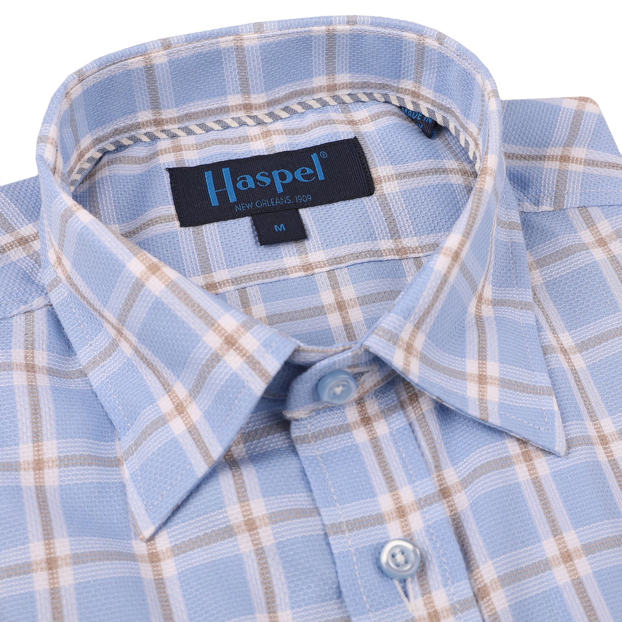 The Treme Light Blue Texture with Tan Check is a timeless design that will instantly upgrade your look. Crafted with a light blue texture and tan check pattern, this piece will be your go-to for special occasions. Perfect for adding a touch of sophistication to your wardrobe.  100% Cotton • Hidden Button Collar • Long Sleeve • Chest Pocket • Machine Washable • Made in Italy • Return Policy