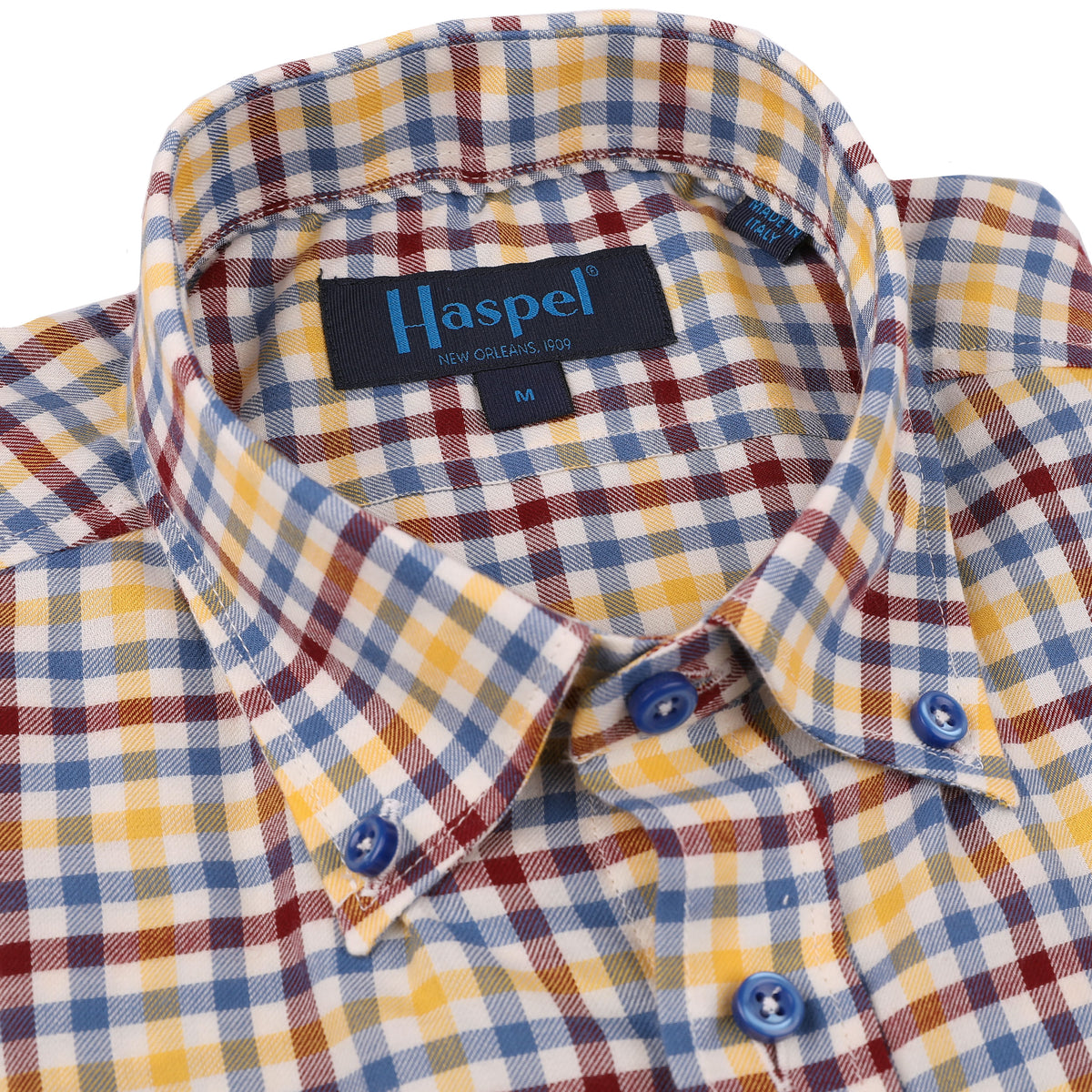 Keep cool in the Franklin Yellow, Blue &amp; Burgundy Brushed Plaid shirt. Crafted with a yellow, blue, and burgundy brushed plaid, this stylish shirt delivers breathability and comfort. Beat the New Orleans heat in this cozy style!  100% Cotton • Short Sleeve • Button Down Collar • No Chest Pocket • Machine Wash • Made in Italy • Return Policy