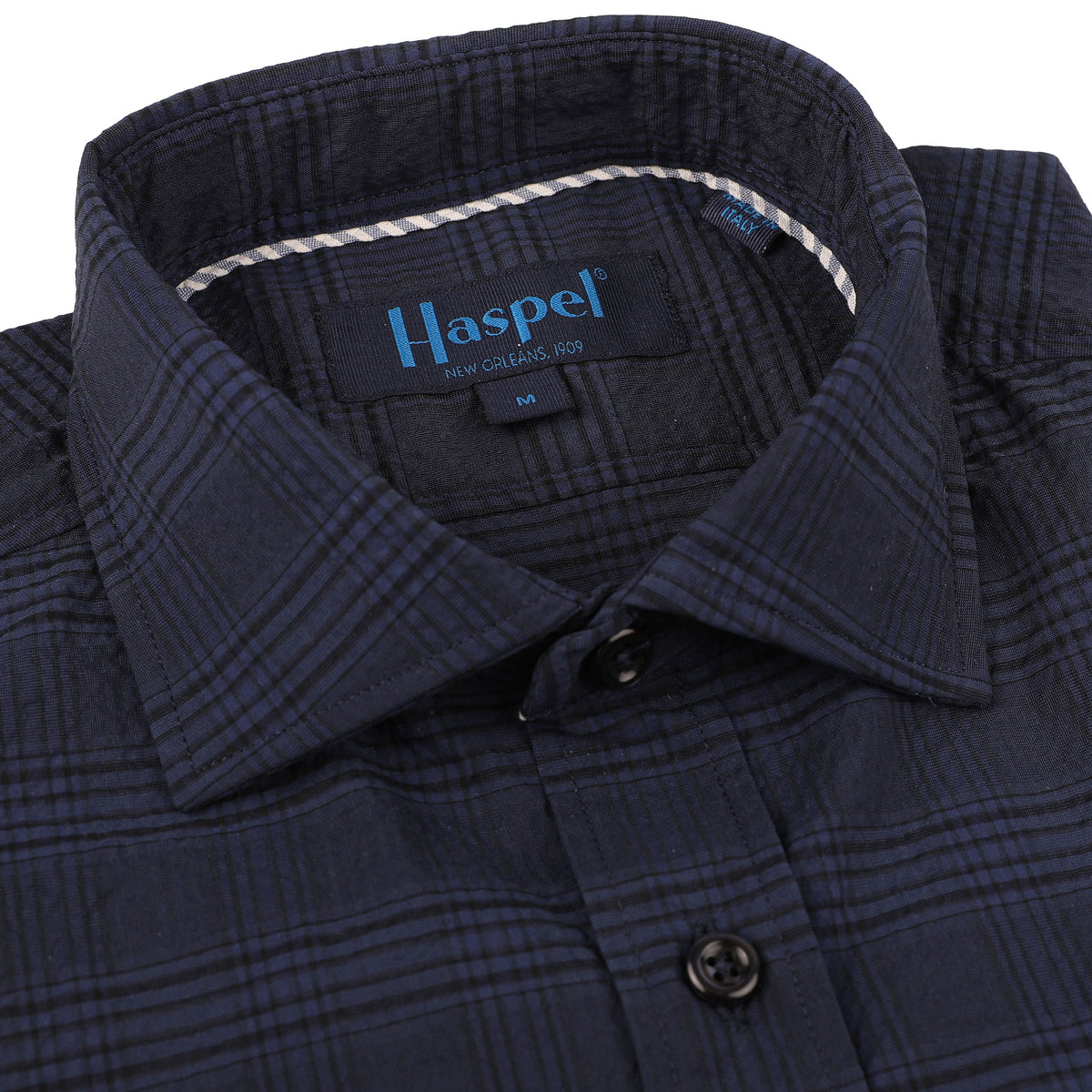 The Chartres Navy Seersucker Check provides classic sophistication. Made from navy seersucker, its timeless design adds elegance to any outfit.   100% Cotton • Spread Collar with Removable Collar Stays • Long Sleeve • Chest Pocket • Machine Washable • Made in Italy • Return Policy
