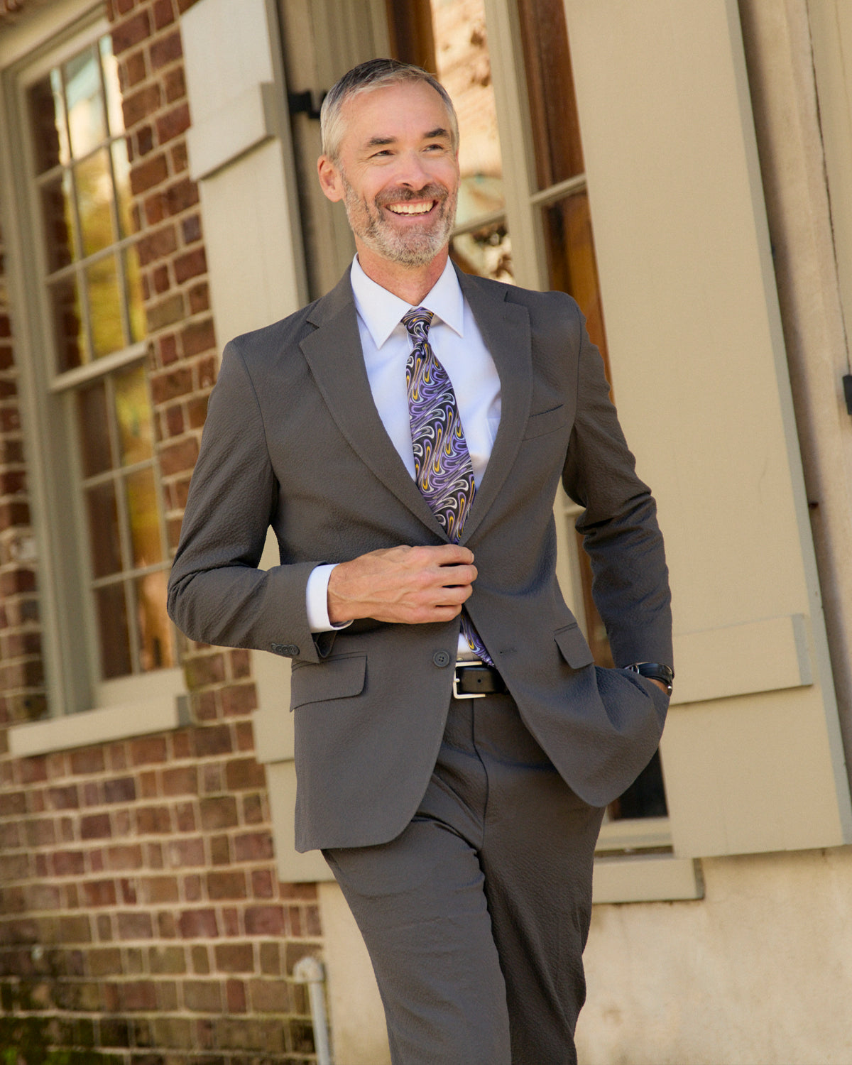 Exploring all the devilry the Big Easy has to offer, you'll cast your spell in our Voodoo Gray Seersucker. Beware the dark arts and dress the part in lightweight American made seersucker. Devilishly daring yet enchantingly divine.  97% Cotton / 3% Lycra Haspel Exclusive Seersucker Stretch Fabric • Maximized Seersucker Pucker • Audubon Classic Fit • Natural Shoulder • Two Buttons • Flap Pockets • 3/4 Lined for Maximum Cool • Side Vents • Notch Lapel • Dry Clean • Made in USA