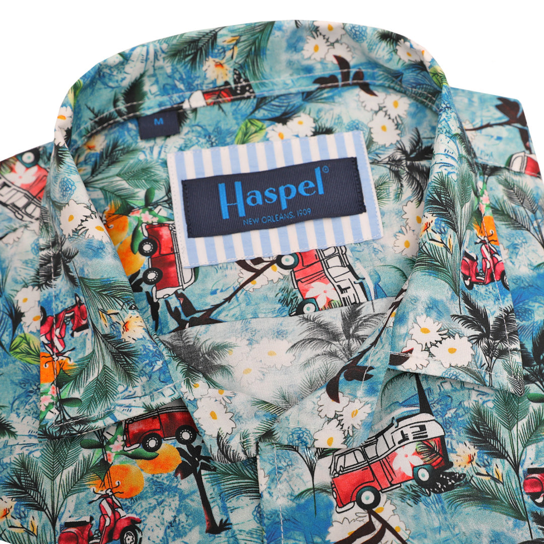 Get ready to channel your inner island vibes with the Clio Tropical Palm Camp Shirt. This playful camp shirt features a vibrant tropical palm print that's perfect for any vacation or summer adventure.&nbsp;