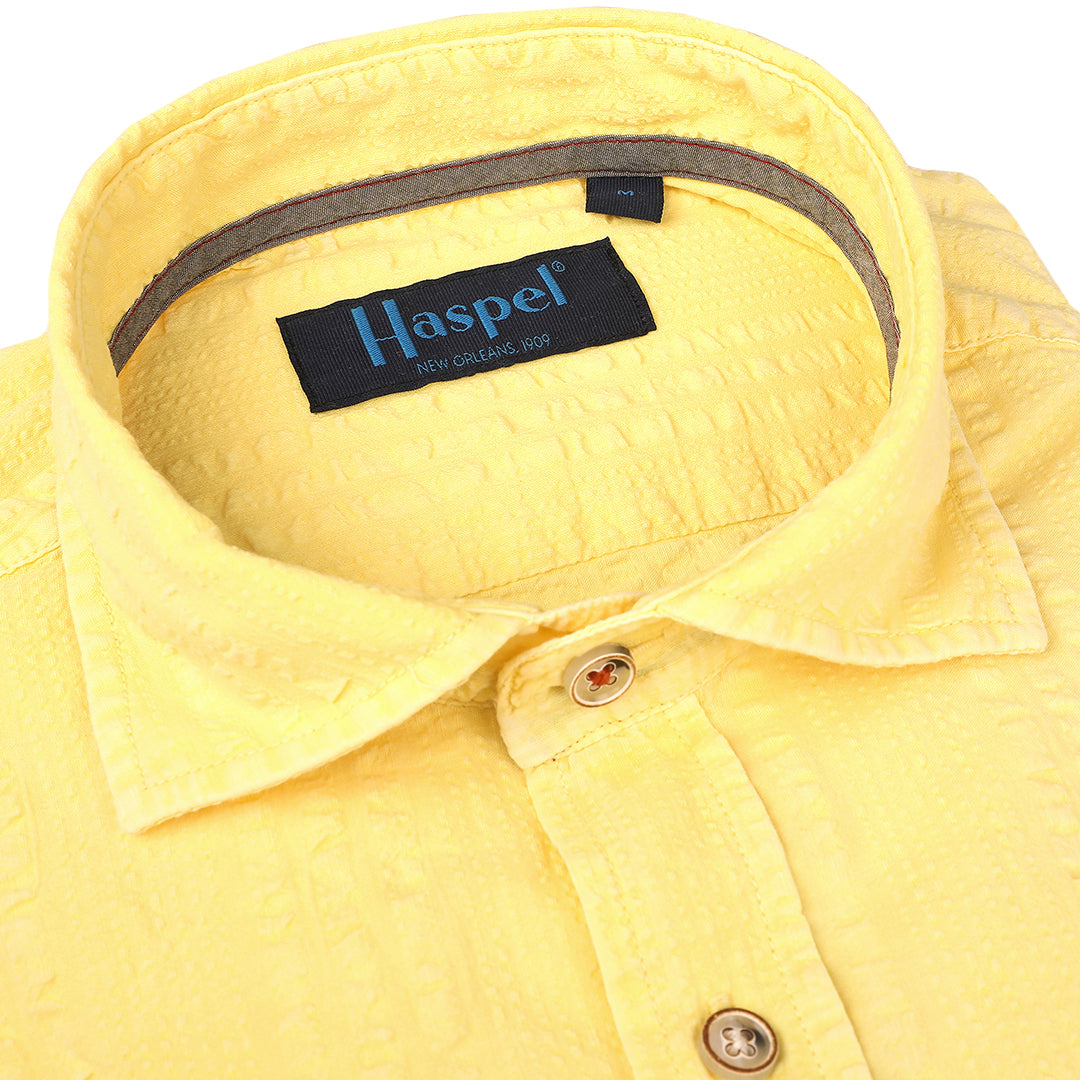 Warm weather good times await with our Riley Yellow Washed Short Sleeve Seersucker. This casual shirt features a relaxed fit and the classic seersucker fabric for a fun, laid-back look in cheery yellow.