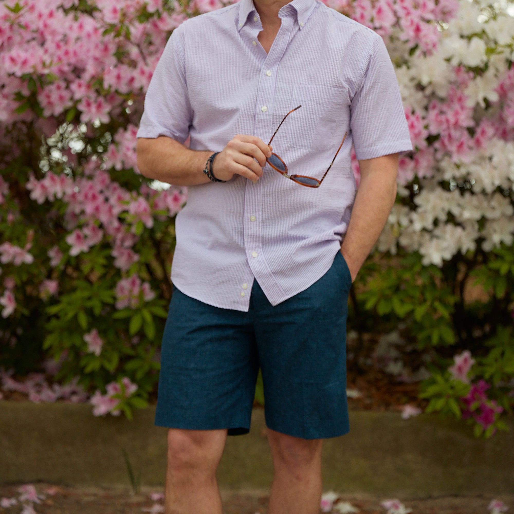 Keep it in neutral with a little intrigue with navy and subtle crosshatch printed on 100% cotton warm weather ready shorts.  100% Cotton • Traditional Fit • Flat Front • Button Through Closure • Two Front Slash Pockets • 9" Inseam • Machine Washable • Imported