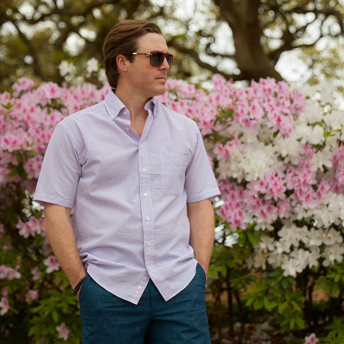 Seersucker all year long in a lavender purple seersucker shirt. Subtle, lightweight, and a texture they begs a second look.  100% Cotton Seersucker • Button Down Collar • Short Sleeve • Chest Pocket • Machine Washable • Made in Italy 