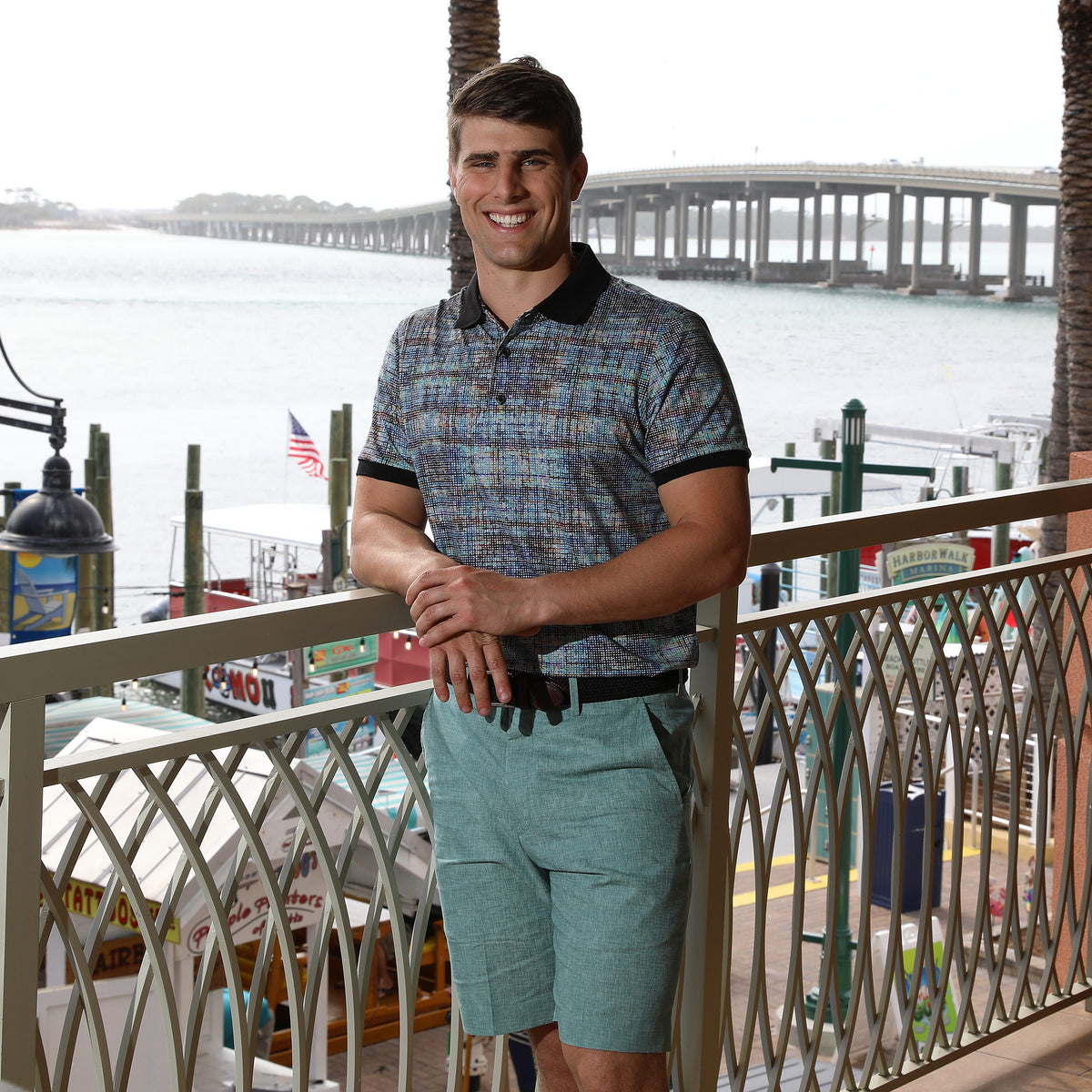 Our Manchac Blue Crosshatch Geometric Print Polo helps you stay dry so you can swing away &#39;til the sun goes down. Hole in one? It&#39;s a guarantee with this polo. So, gather your friends for a day on the green and get ready for some good times!  93% Cotton / 3% Spandex • Contrast Knit Collar Band and Cuff • 3 Button Placket • No Chest Pocket 