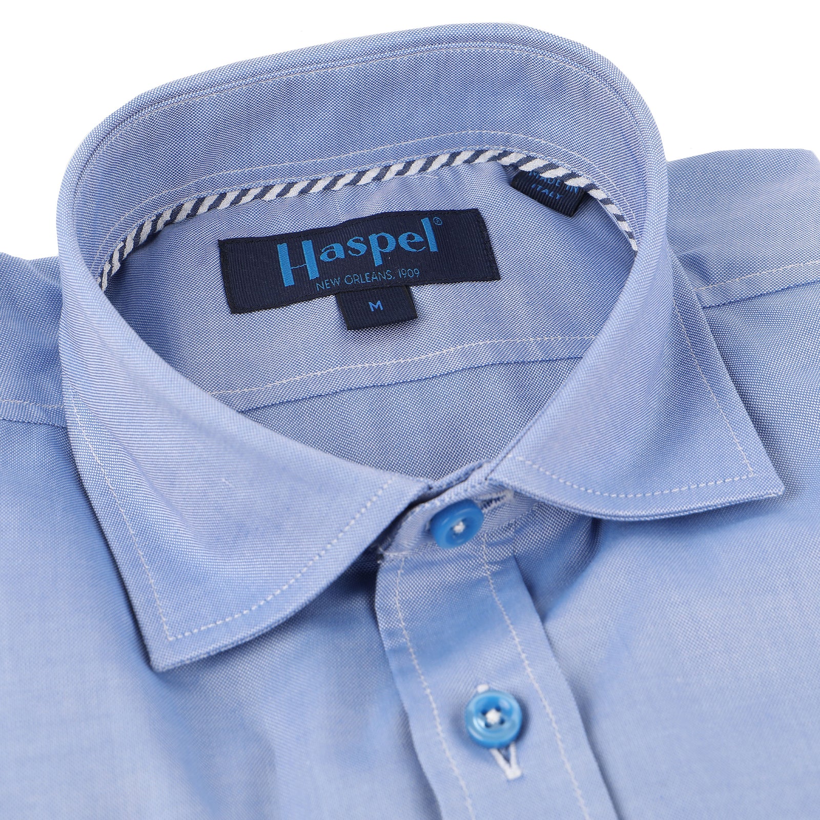 Enjoy the luxury of 100% cotton, Italian made quality, and classic blue oxford. Pairs perfectly with our blue and white striped seersucker suits.   100% Cotton • Spread Collar • Long Sleeve • Chest Pocket • Machine Washable • Made in Italy