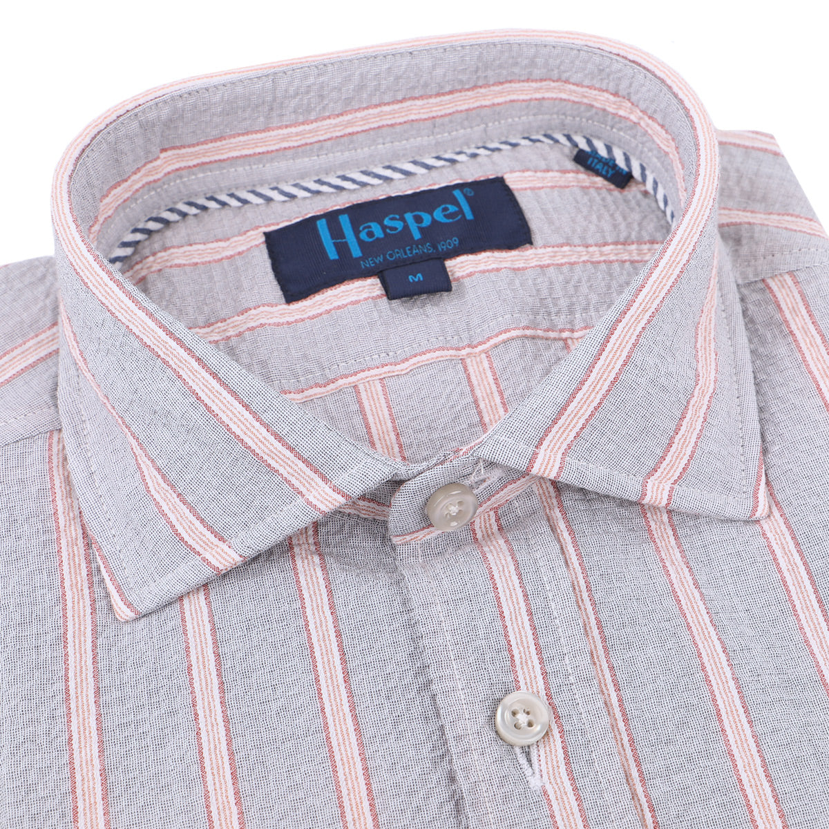 Seersucker is our game, let us help you with yours. Distinctive stripes to stand out and our unique seersucker texture to keep you cool.   100% Cotton Seersucker • Spread Collar • Long Sleeve • Chest Pocket • Machine Washable • Made in Italy