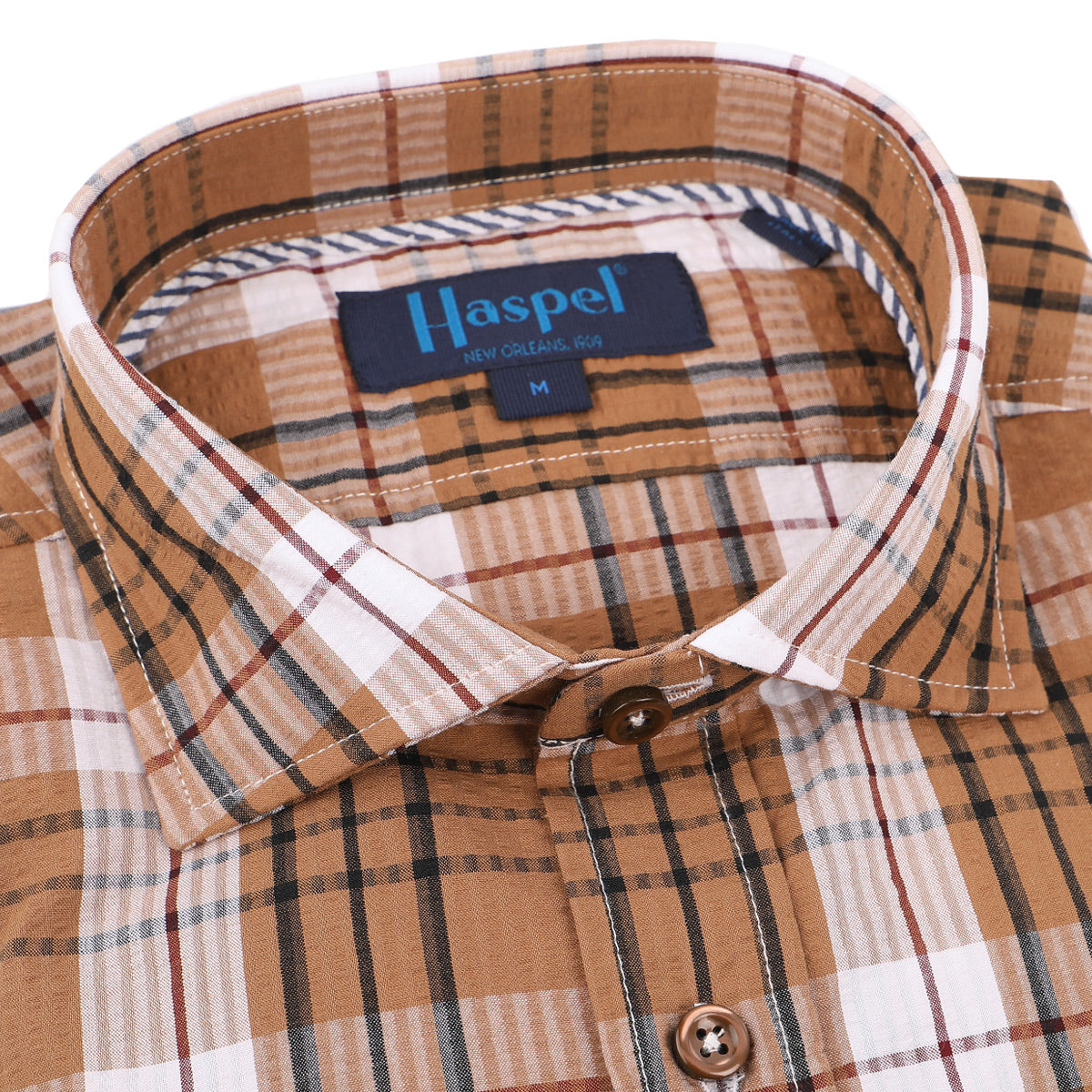 That flannel look without the flannel heat. Designed for Louisiana, enjoyed by all. Stay cool in seersucker.  100% Cotton Seersucker • Spread Collar • Long Sleeve • Chest Pocket • Machine Washable • Made in Italy