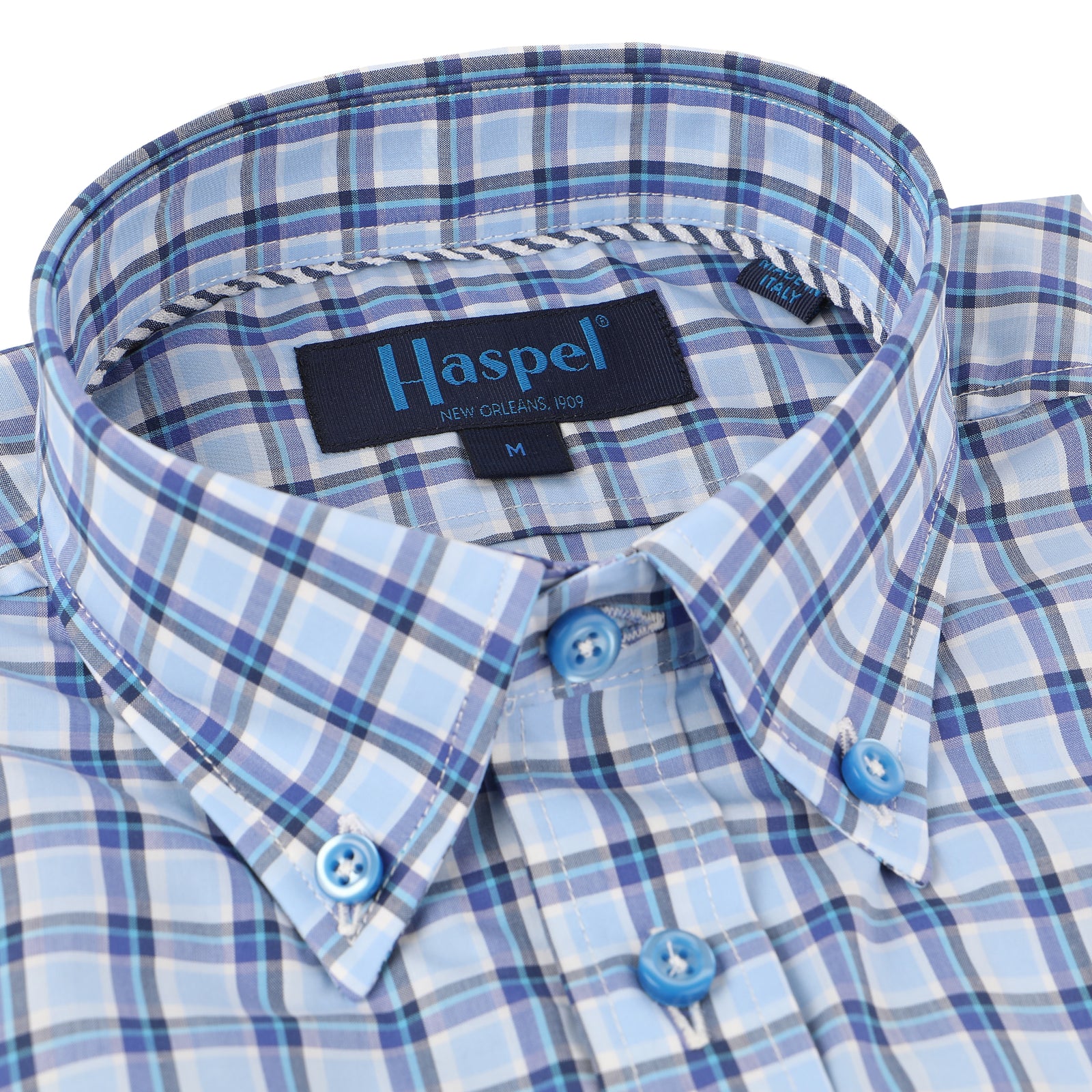 Enjoy the luxury of 100% cotton, Italian made quality, and bold navy & light blue plaid.  100% Cotton • Button Down Collar • Long Sleeve • Contrast Buttons • Chest Pocket • Machine Washable • Made in Italy 