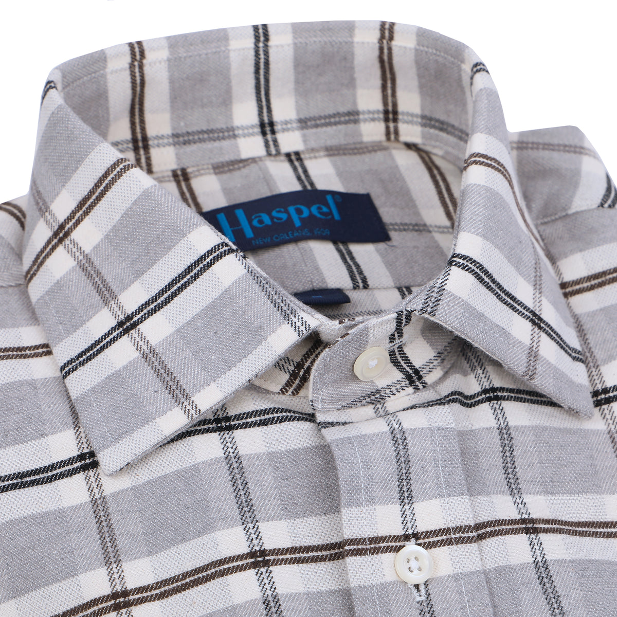 Kick it in neutral gray plaid. Classic style and brushed cotton for comfort.  100% Cotton • Long Sleeve • Spread Collar • Chest Pocket • Classic Fit 