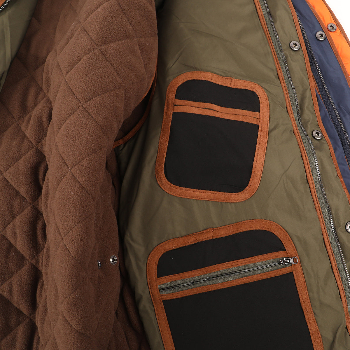 Saturday morning to Saturday night, The Sportsman was designed with interior pockets for all your gear. Get ready for sports and good times!   100% Polyester Vest  •  Quilted Shell &amp; Warm Fleece Interior  •  Full Front Zip with Snap Button Closure  •  Four Inside Pockets  •  Machine Wash - lay flat or hang to dry  •  Imported