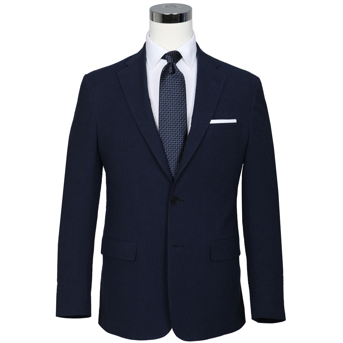 A nod to one of our favorite New Orleans cocktails, spiced with the warmth of cognac. Navy spiced up with the worlds best seersucker pucker. Always cool.   97% Cotton / 3% Lycra Haspel Exclusive Seersucker Stretch Fabric  •  Maximized Seersucker Pucker  •  Audubon Classic Fit  •  Natural Shoulder  •  Two Buttons  •  Flap Pockets  •  3/4 Lined for Maximum Cool  •  Side Vents  •  Notch Lapel  •  Dry Clean  •  Made in USA