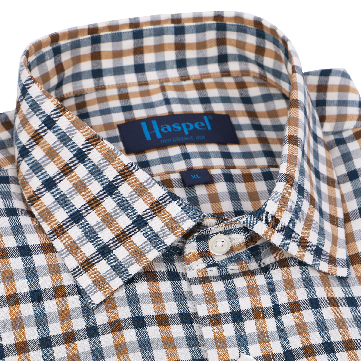 Deep navy &amp; caramel check will keep you looking fresh all season long. Brushed cotton for a supremely soft, lightweight feel.  100% Cotton • Long Sleeve • Spread Collar • Chest Pocket • Classic Fit 